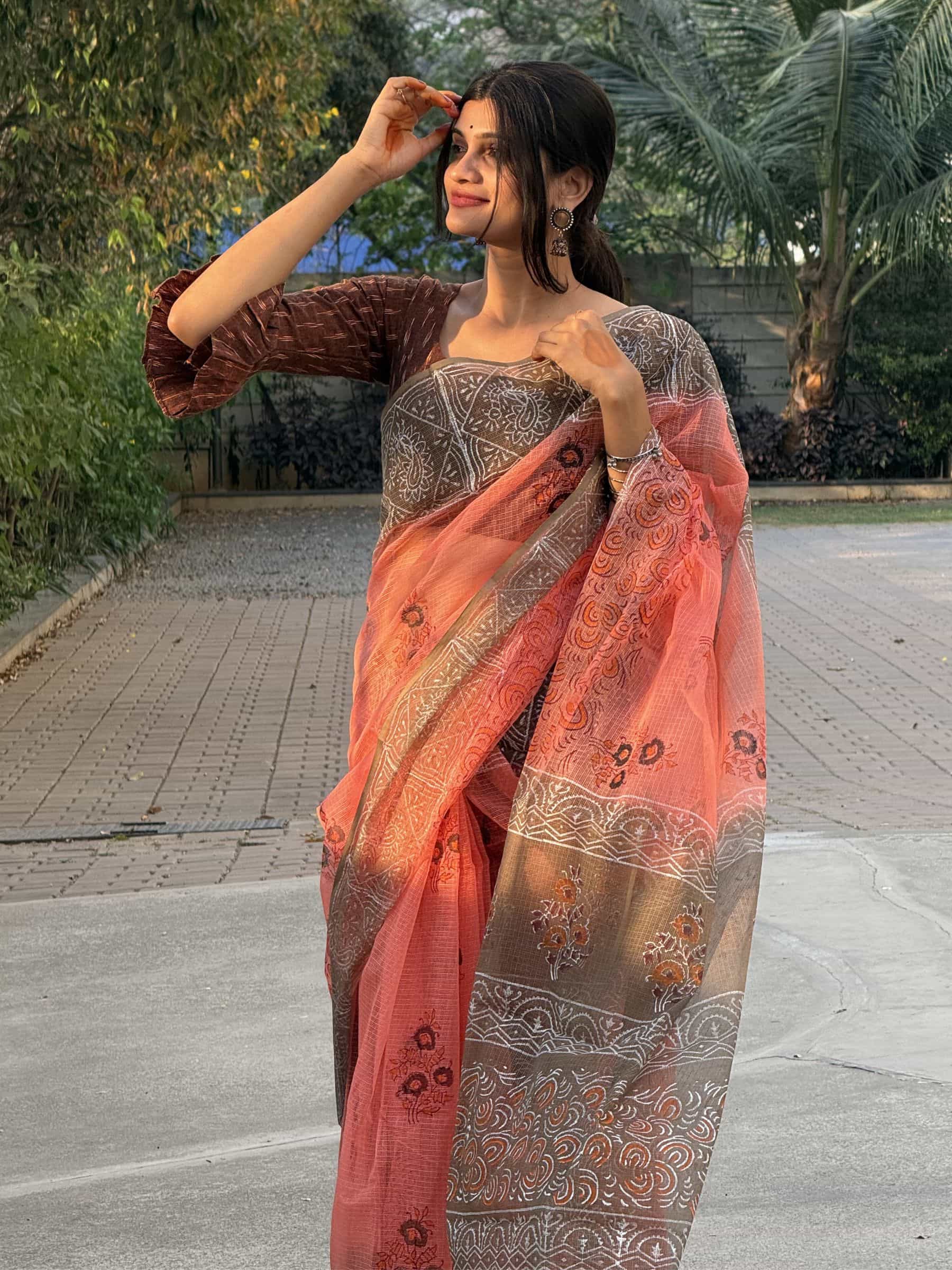 Coral red hand block printed Kota Doria saree