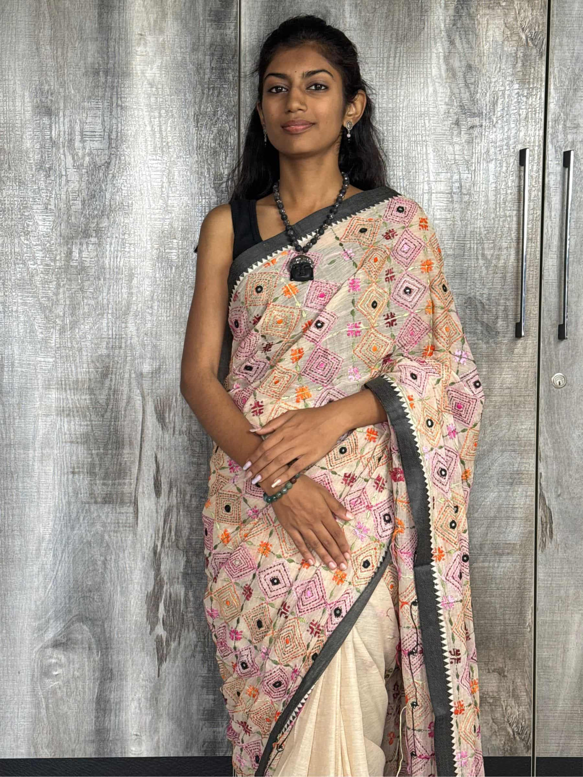 Beige Dhonekhali Tant cotton saree with geometric hand embroidery