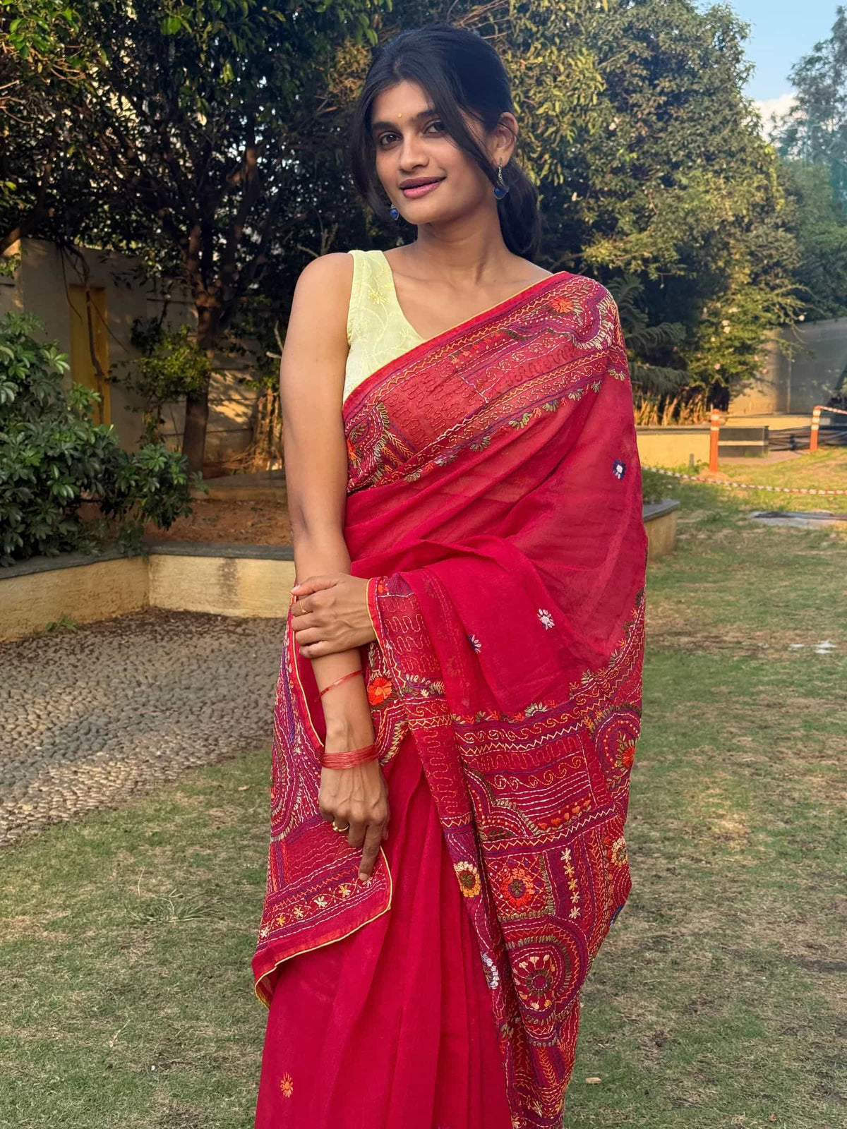Handloom red Dhonekhali Tant saree with colorful embroidered border