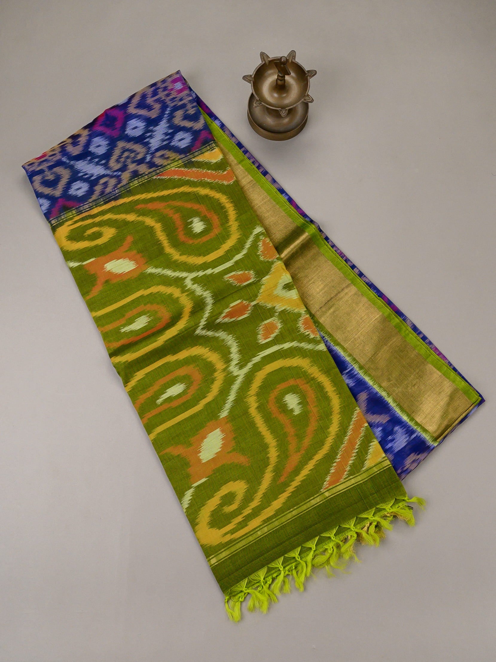 Handloom Pochampally silk cotton saree in blue and green with paisley Ikat weave