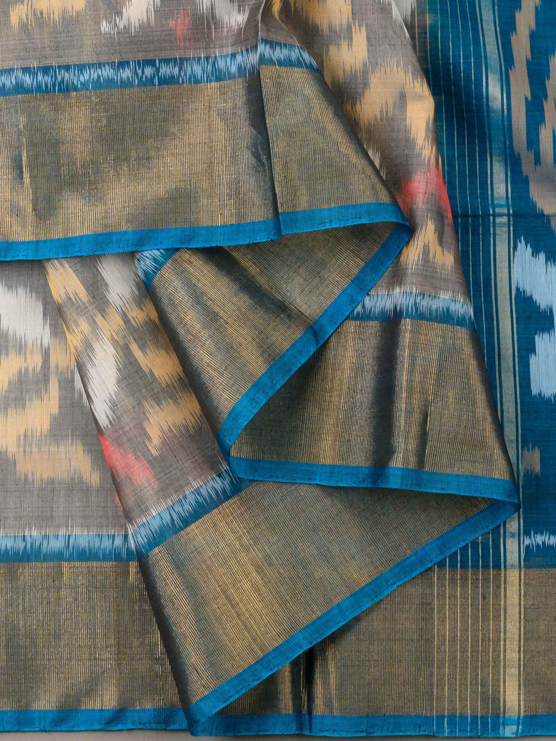 Handloom Pochampally Silk Cotton Saree in Grey and Blue with Ikat Design