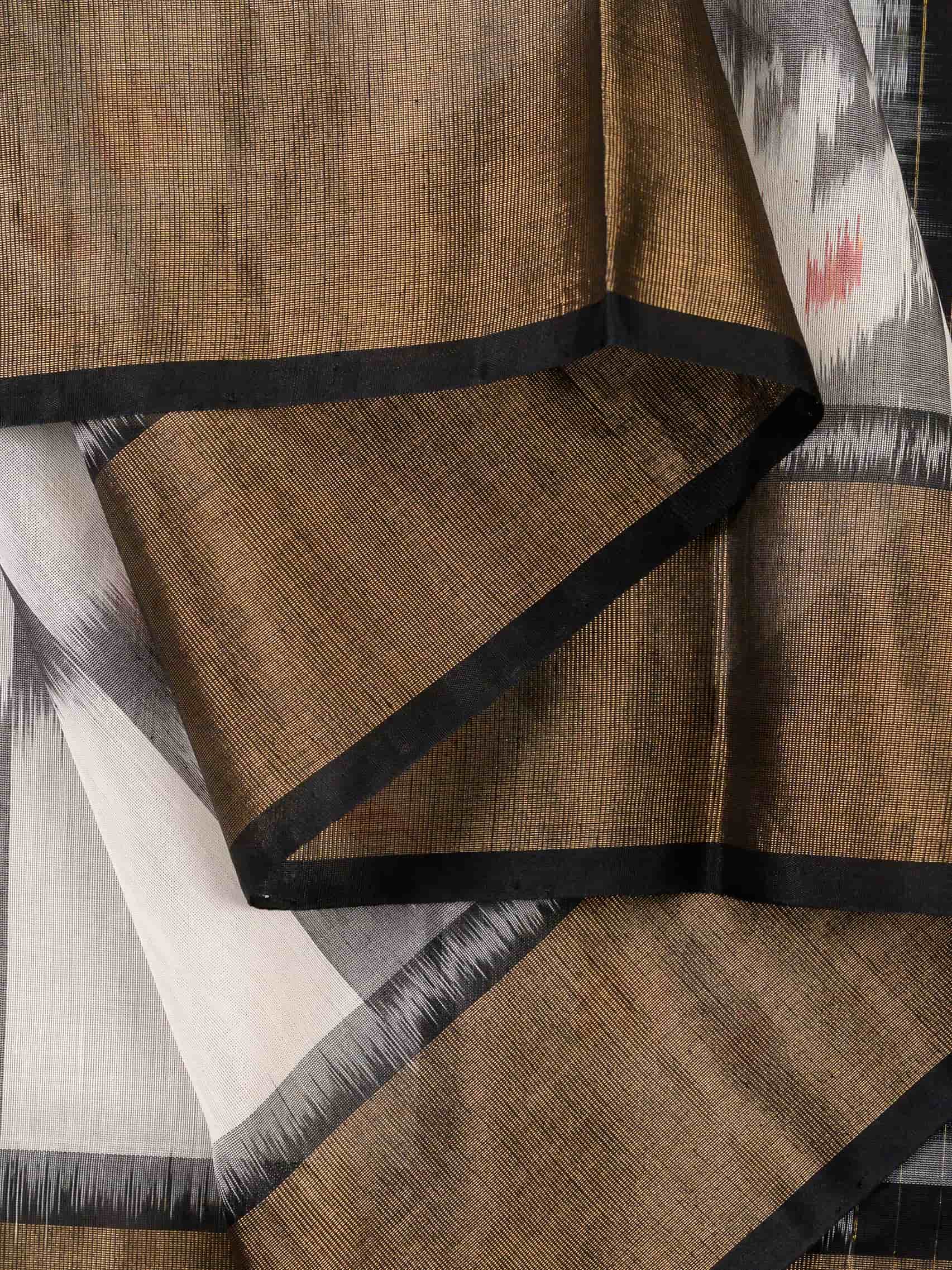 Handloom Pochampally Silk Cotton Saree in White and Black with Floral Ikat Design