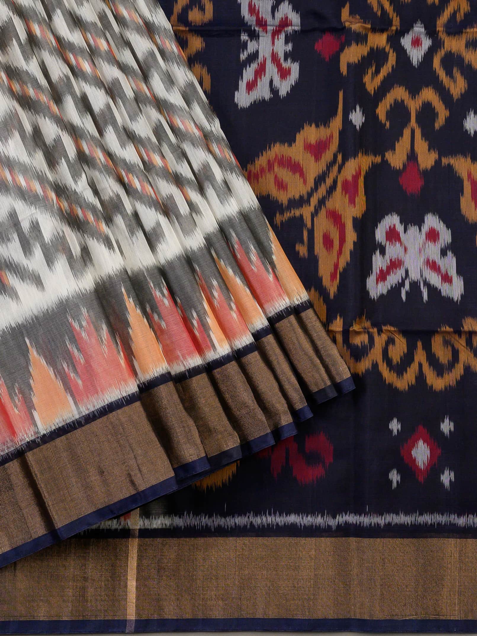 Handloom Pochampally Silk Cotton Saree in White and Blue with Zigzag Ikat Design