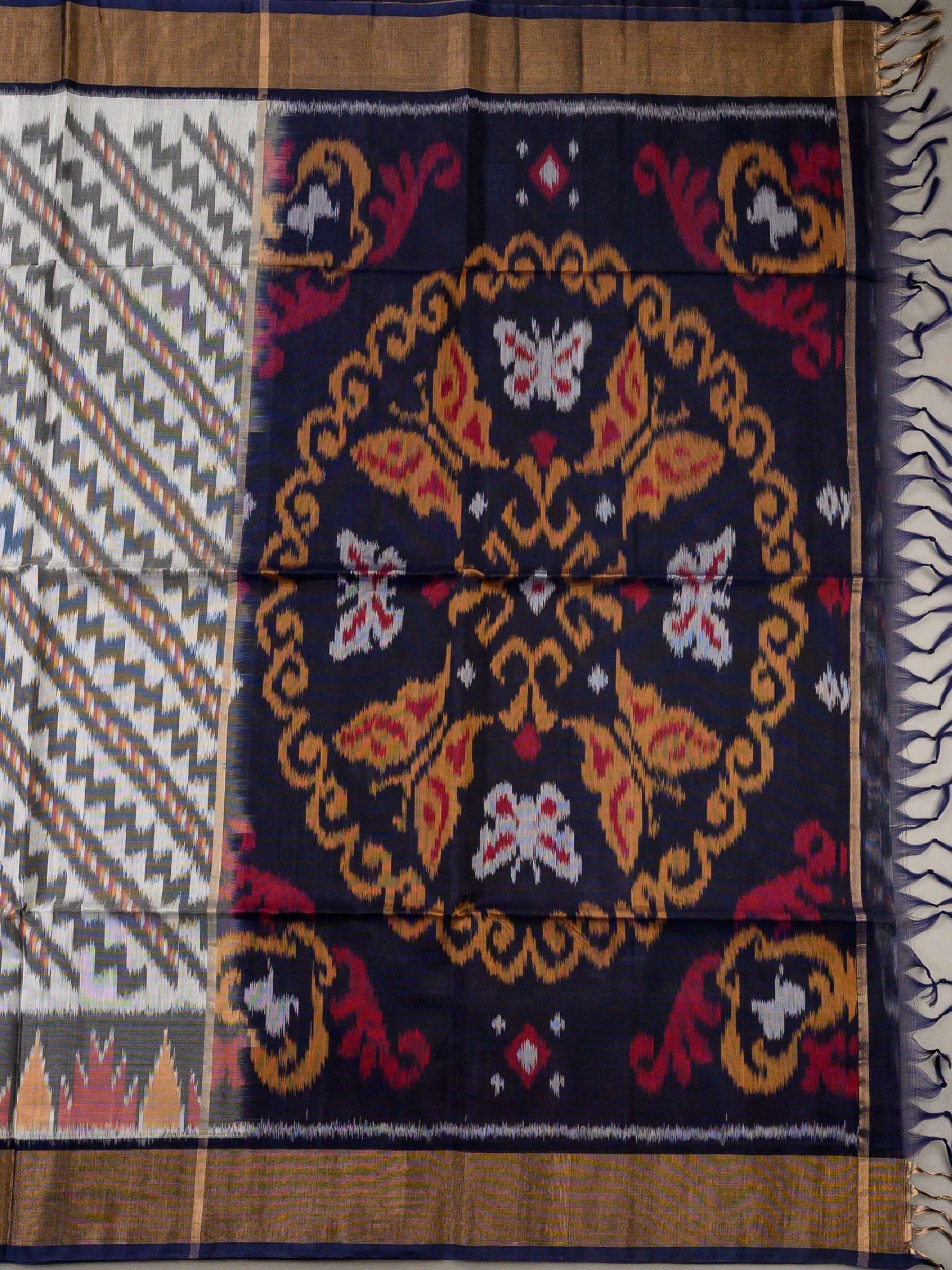 Handloom Pochampally Silk Cotton Saree in White and Blue with Zigzag Ikat Design