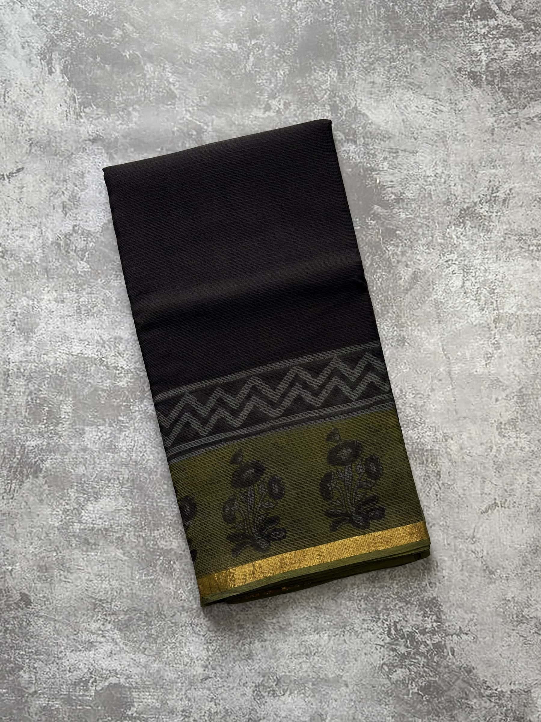 Black hand block printed Kota Doria saree with olive green pallu
