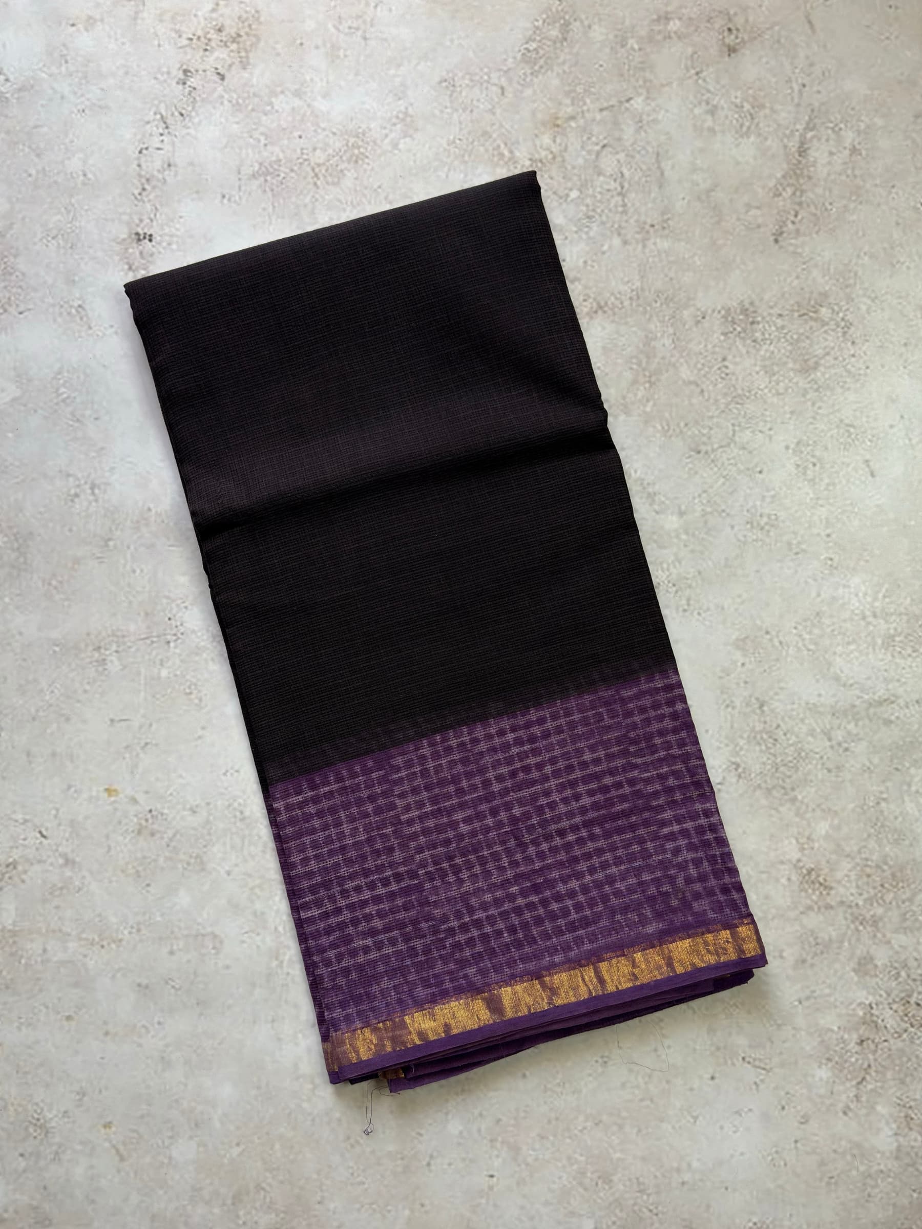 Black Kota Doria saree with purple block printed pallu