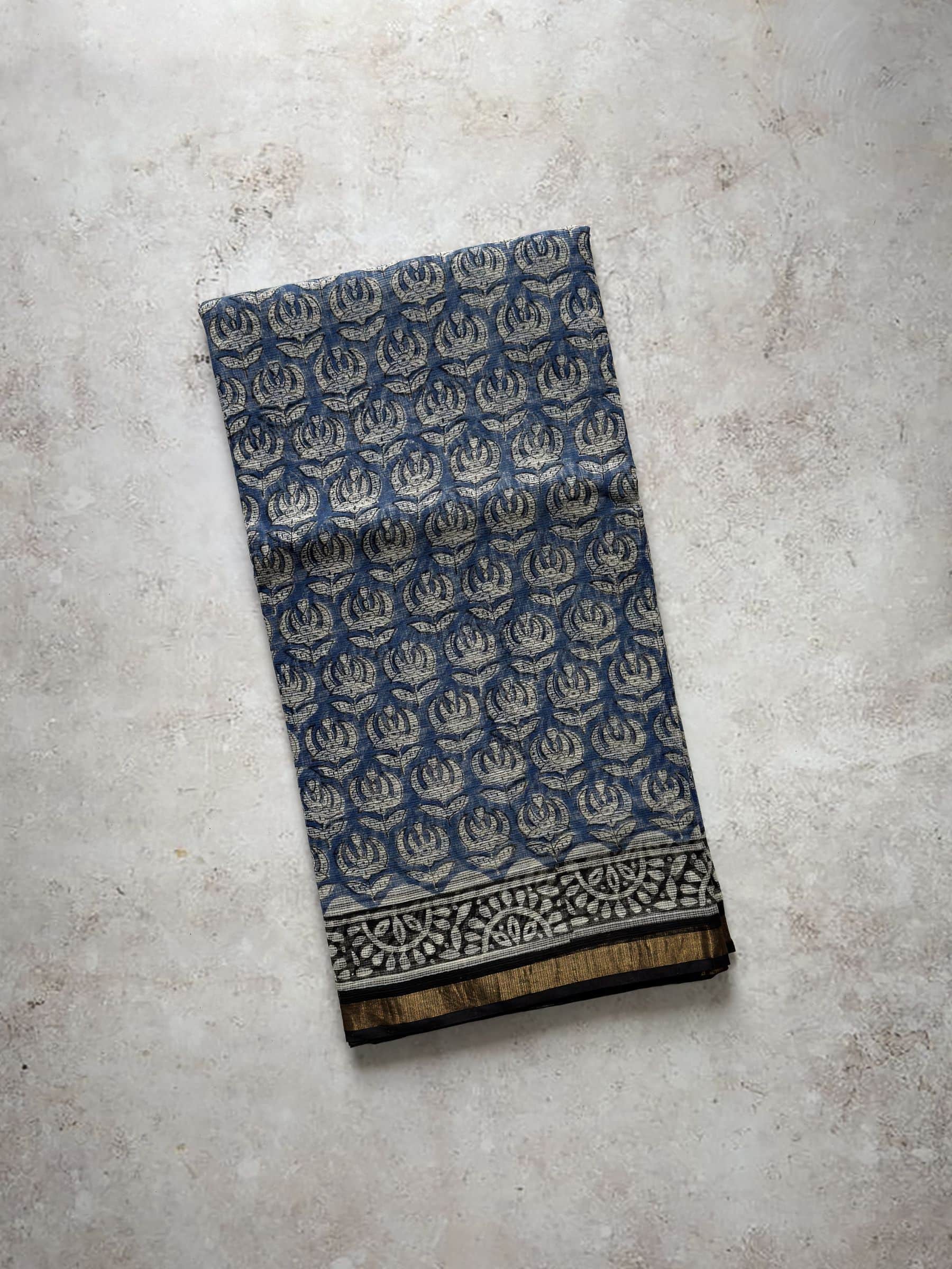Blue hand block printed Kota Doria saree with floral motifs and multicolor pallu