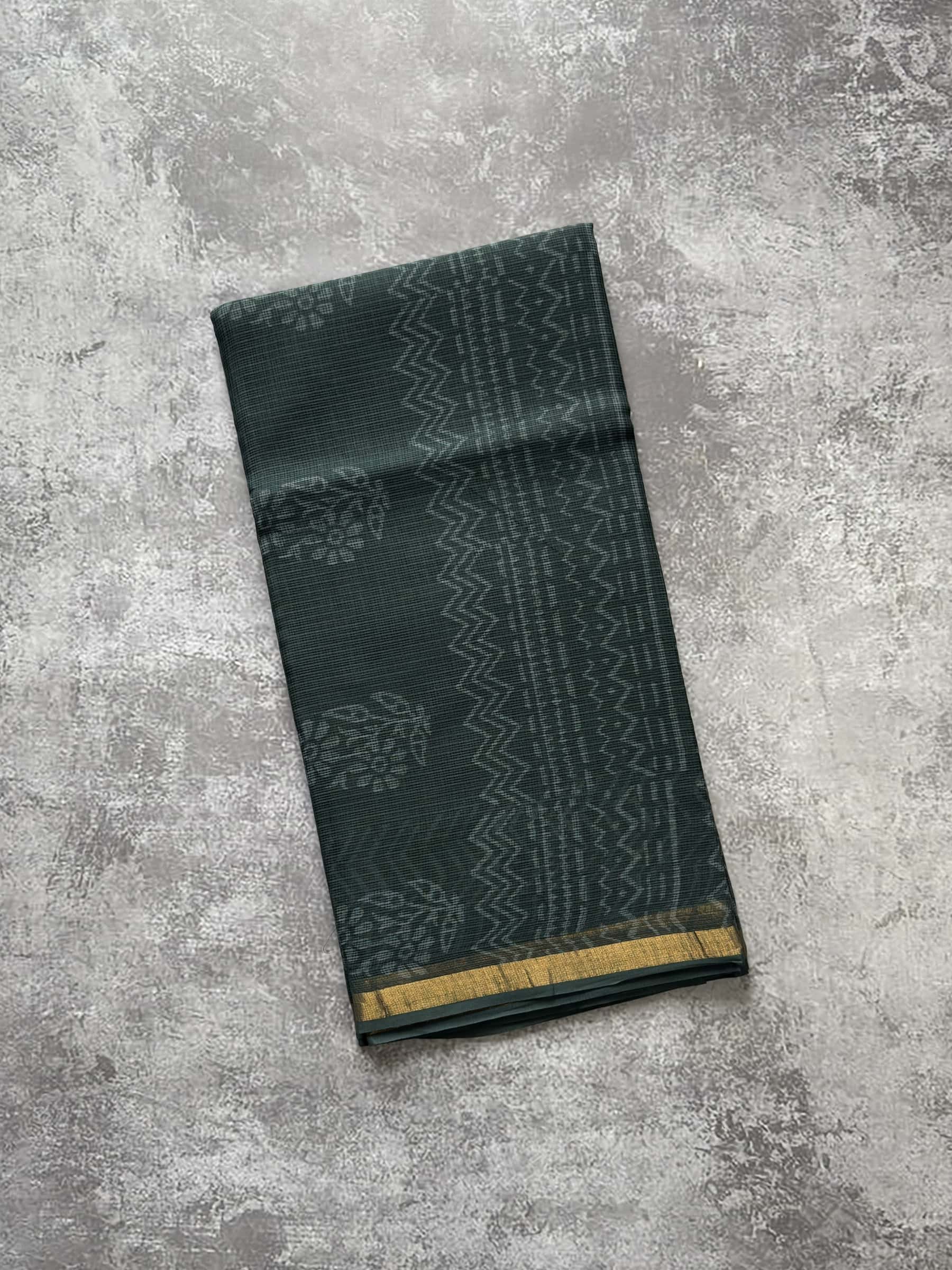 Deep teal hand block printed Kota Doria saree with paisley motifs