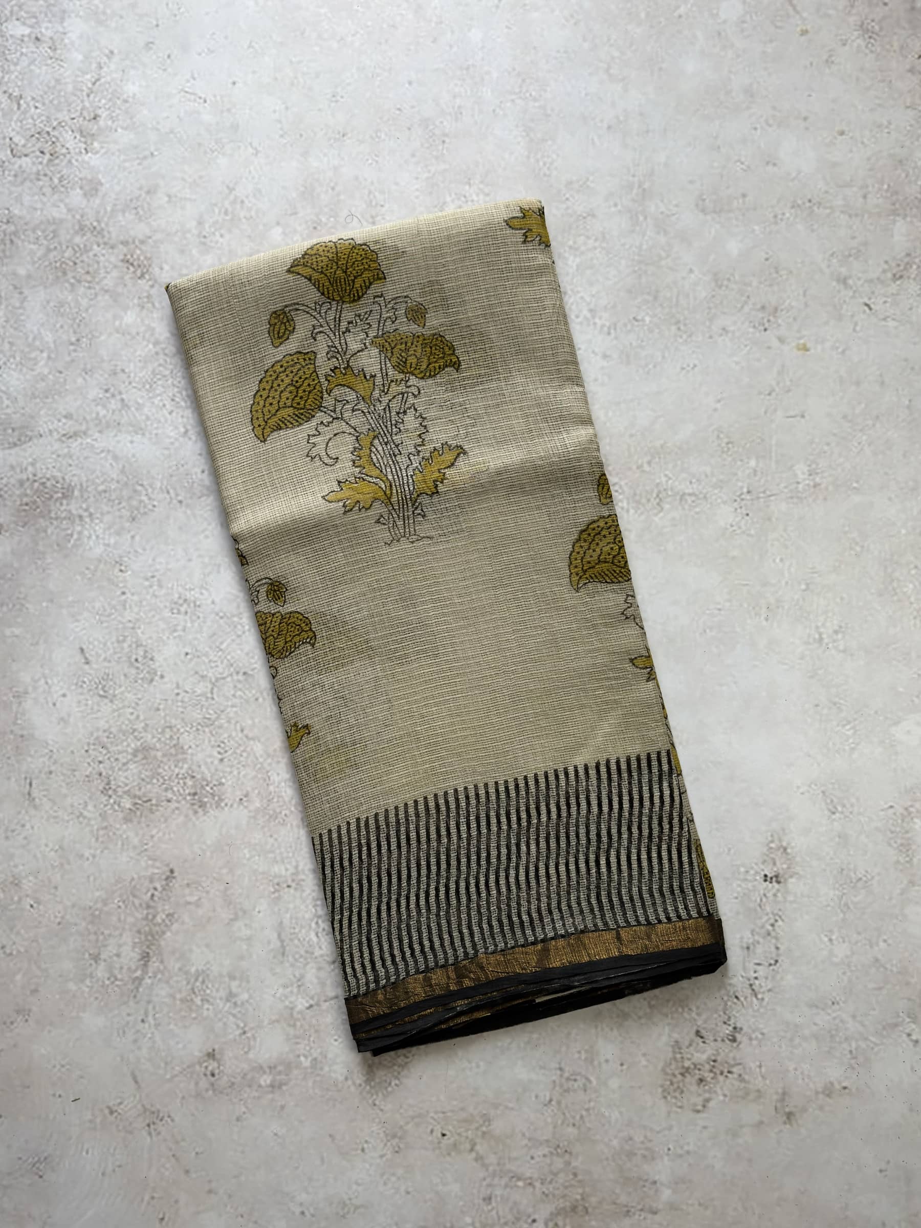 Ivory hand block printed Kota Doria saree with mustard floral motifs