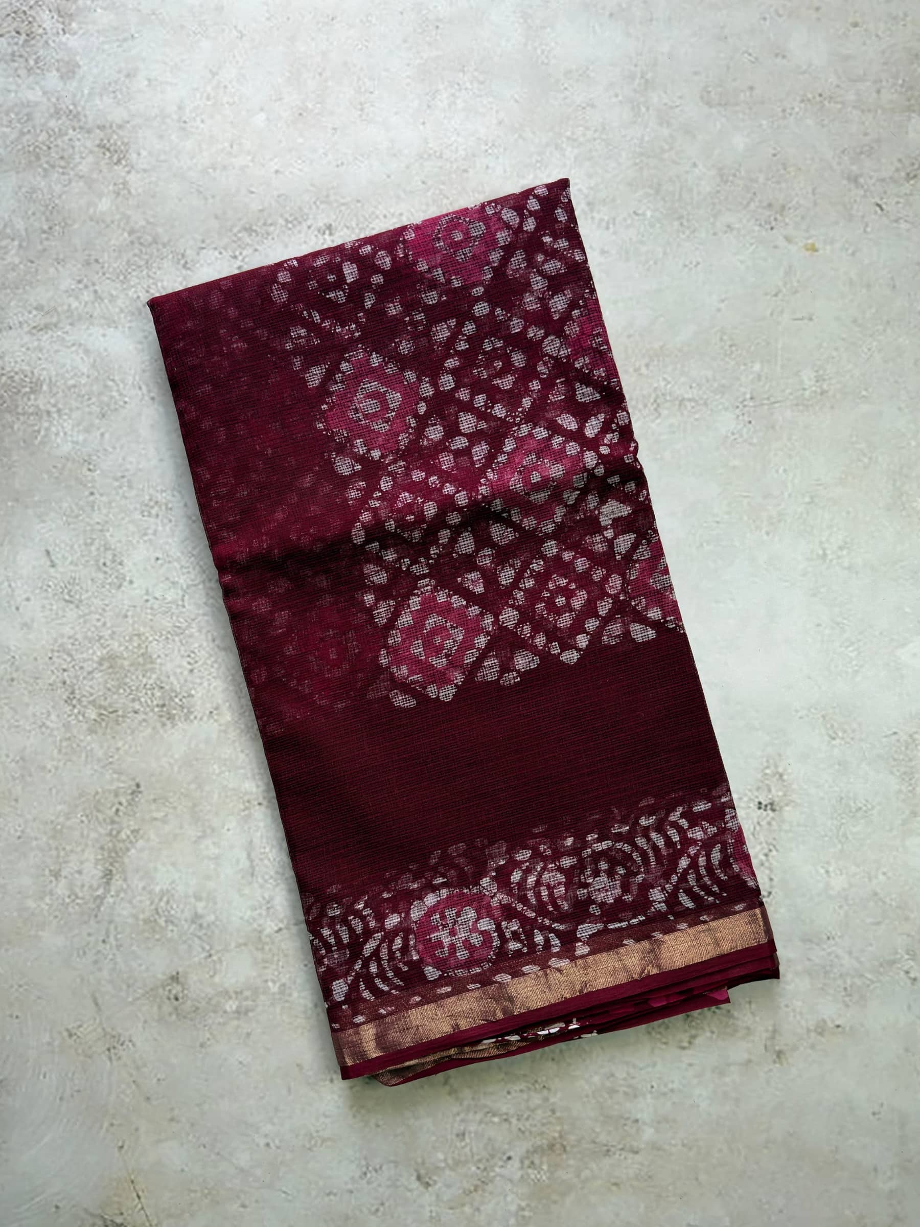 Maroon kota doria block printed cotton saree with traditional motifs