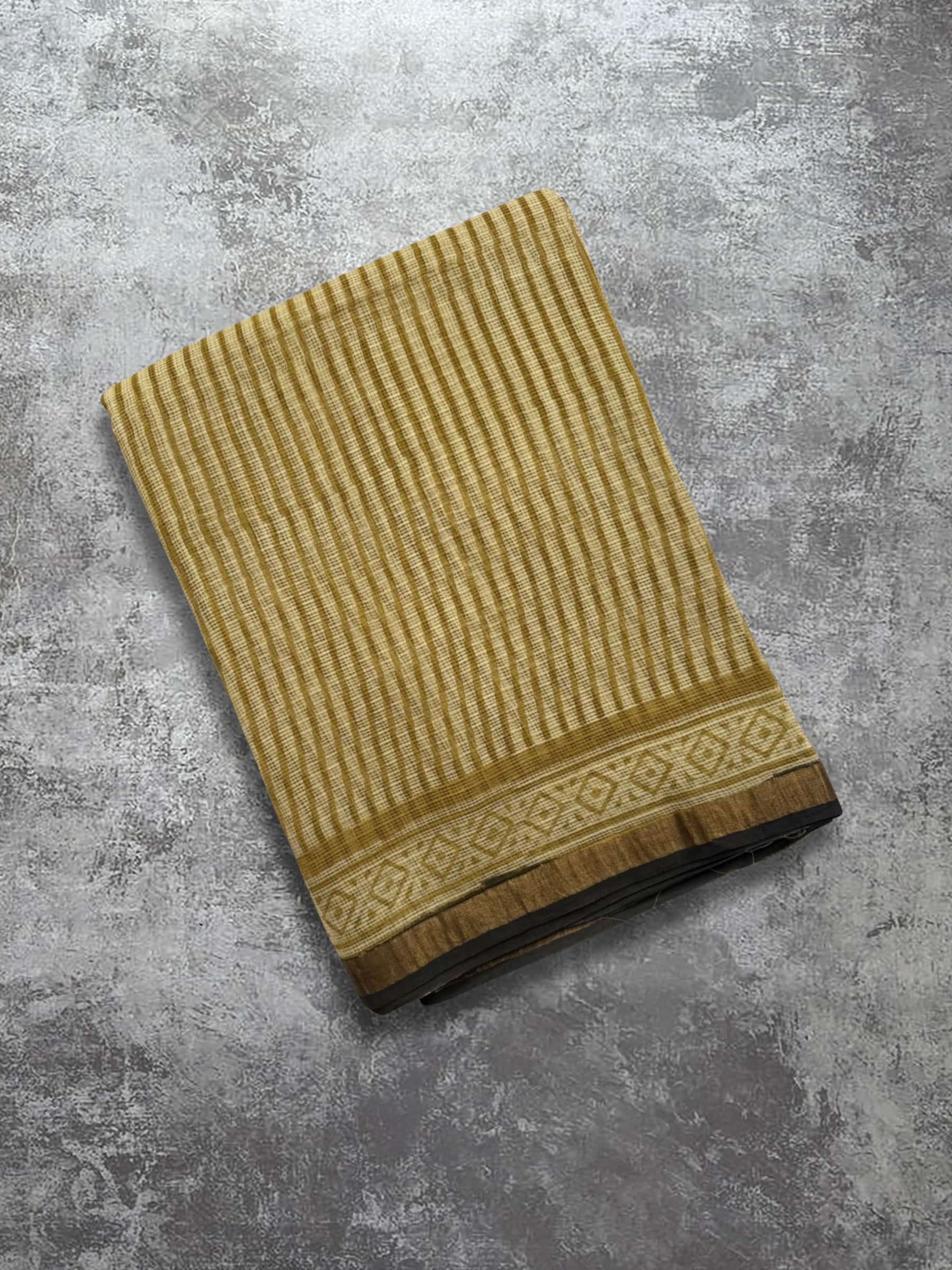 Mustard Kota Doria block printed saree with traditional pallu