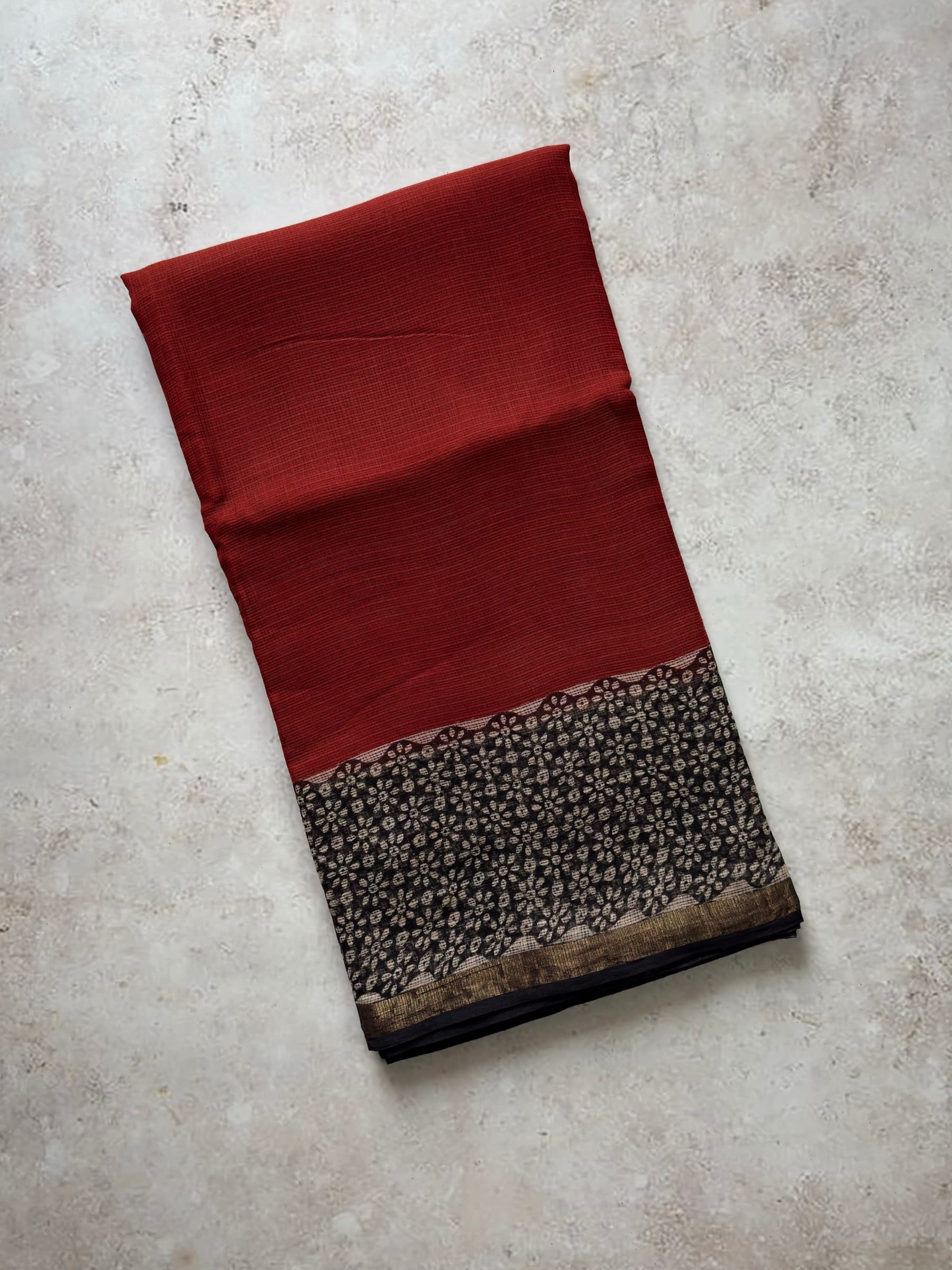 Rust red hand block printed Kota Doria saree