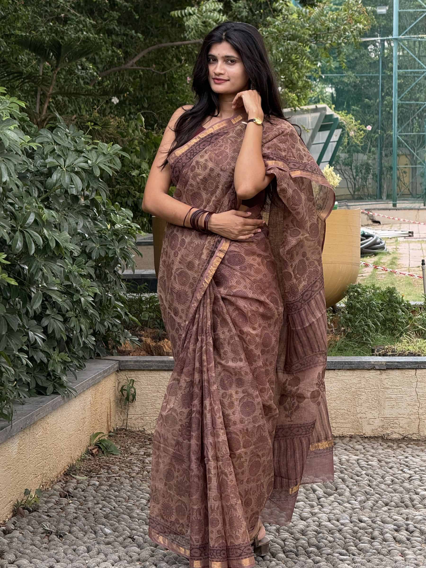 Hand block printed Vanaspati Kota Doria saree with floral garden motifs in beige and dusty mauve