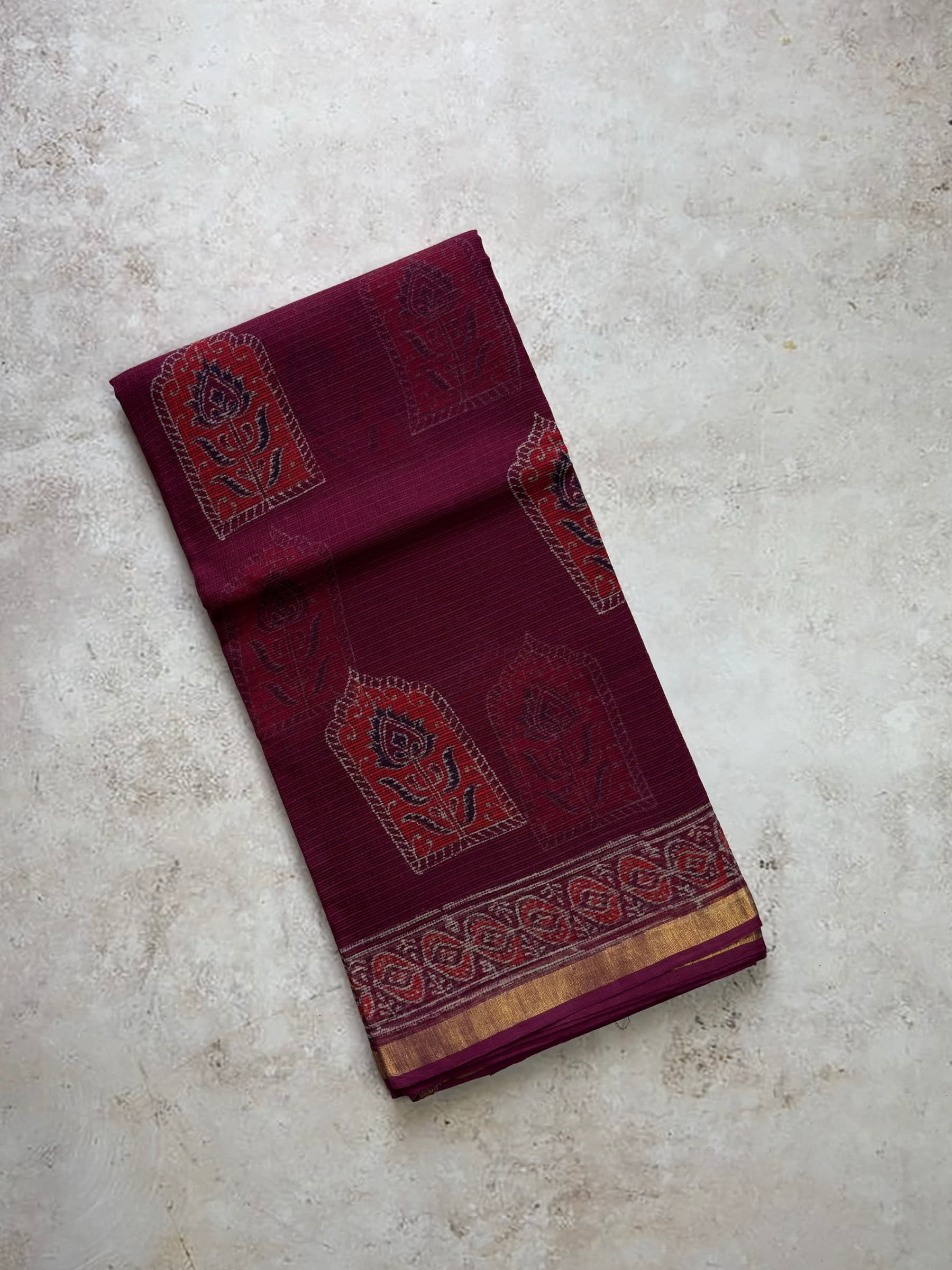 Wine shade Kota Doria block printed saree with wine pallu