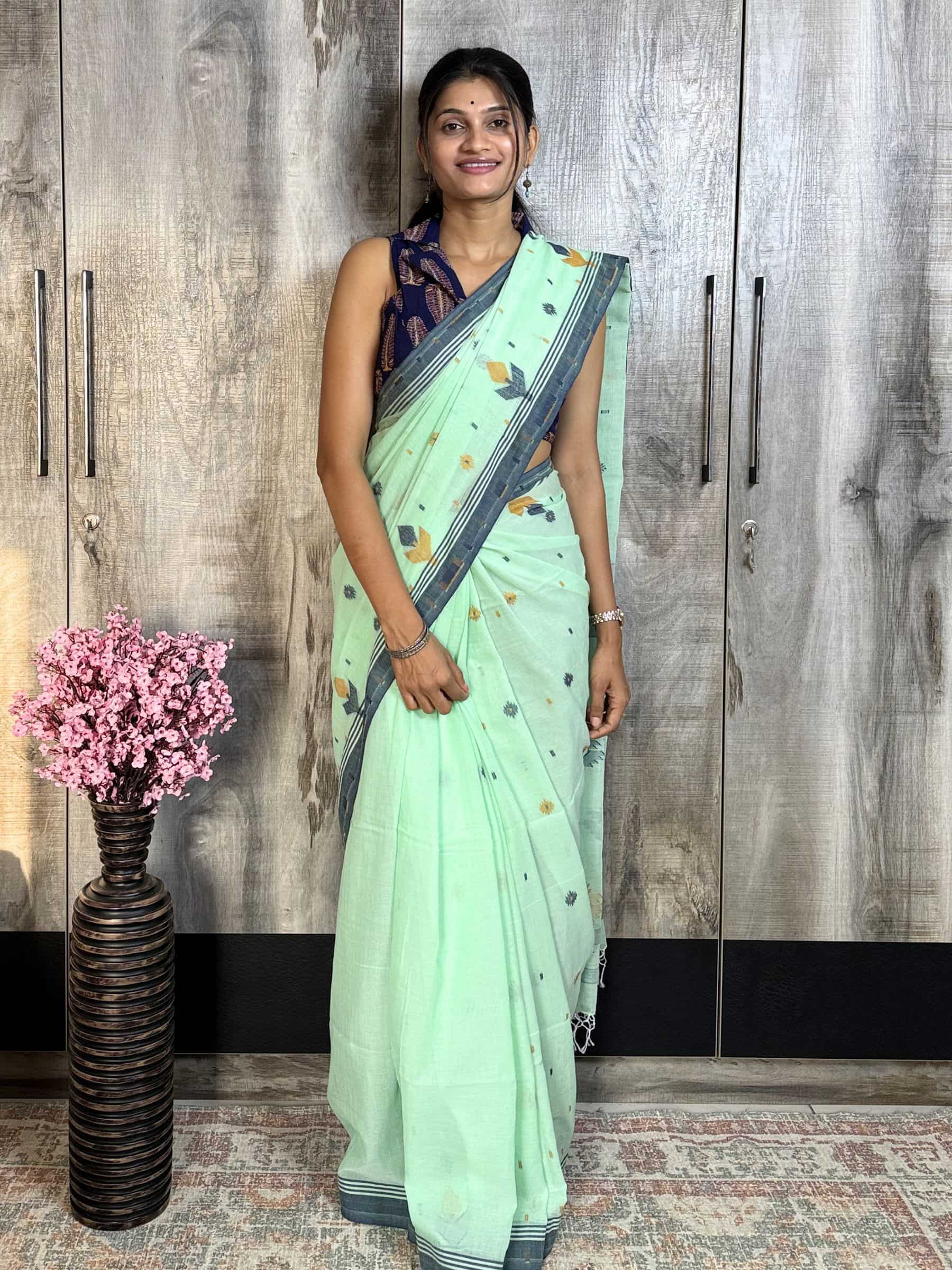 Mint green jacquard Jamdani cotton saree with grey border