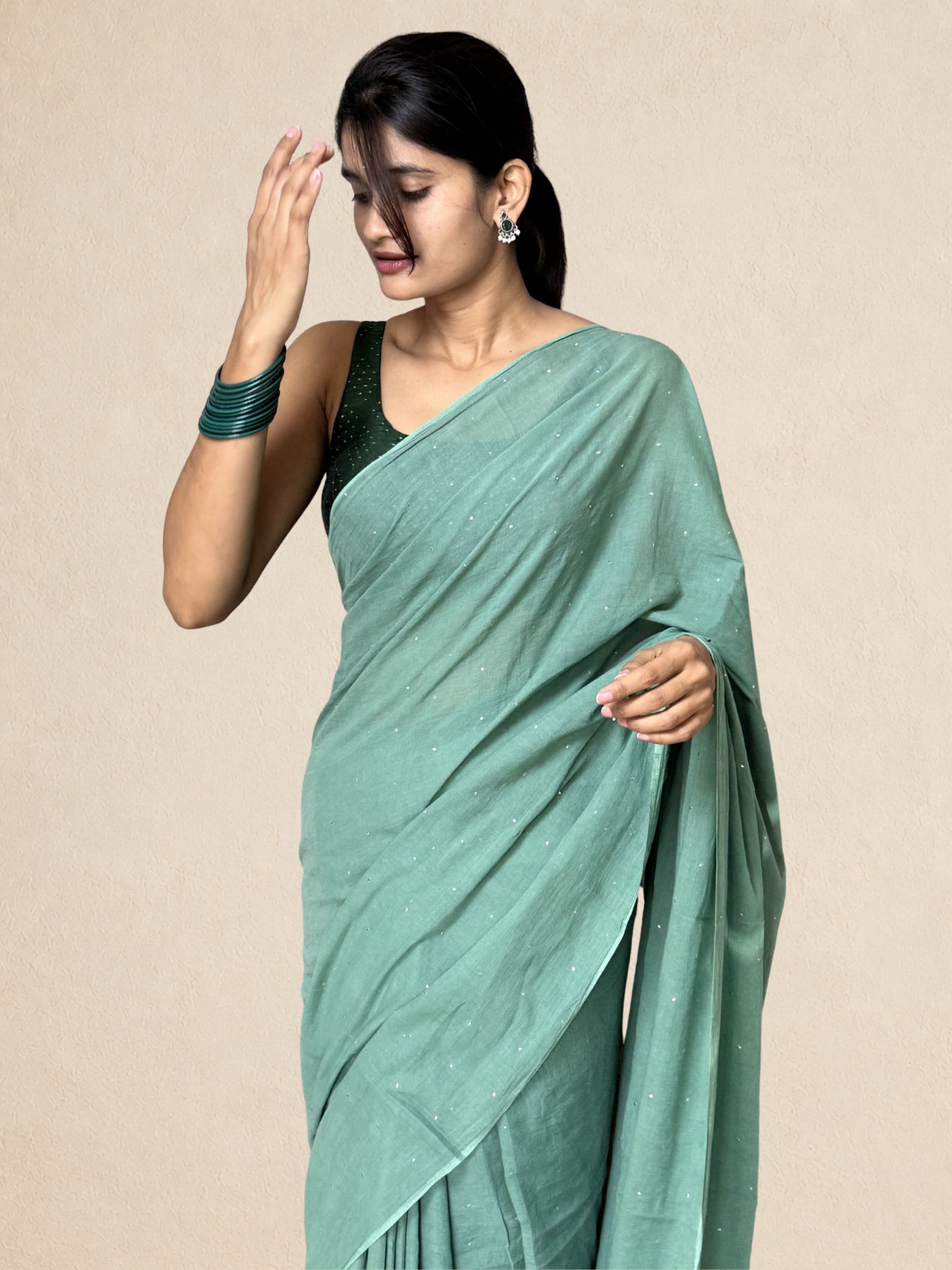 Mukaish Mul Cotton Saree with Crochet Work in Teal Green