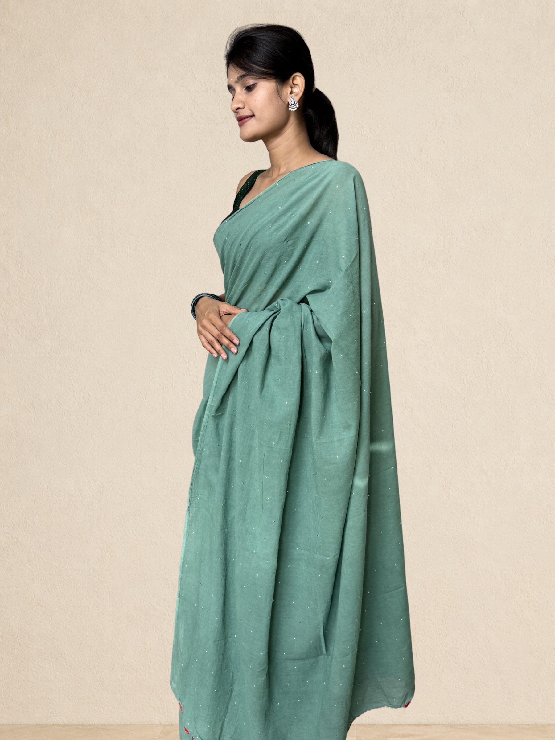 Mukaish Mul Cotton Saree with Crochet Work in Teal Green