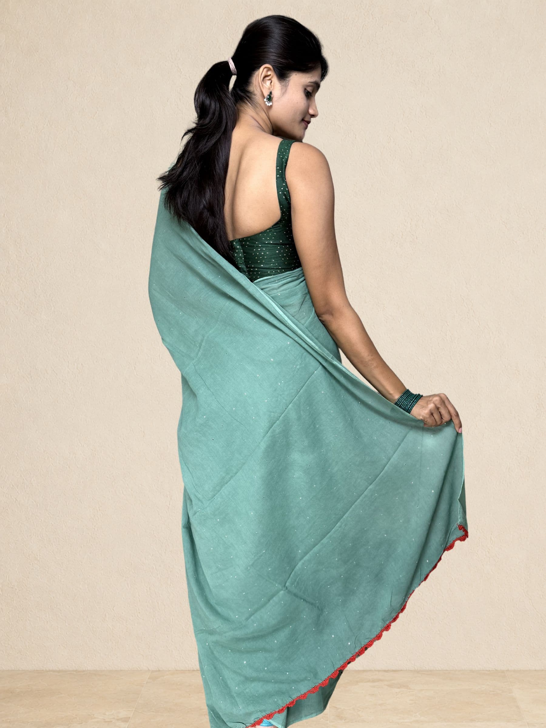 Mukaish Mul Cotton Saree with Crochet Work in Teal Green