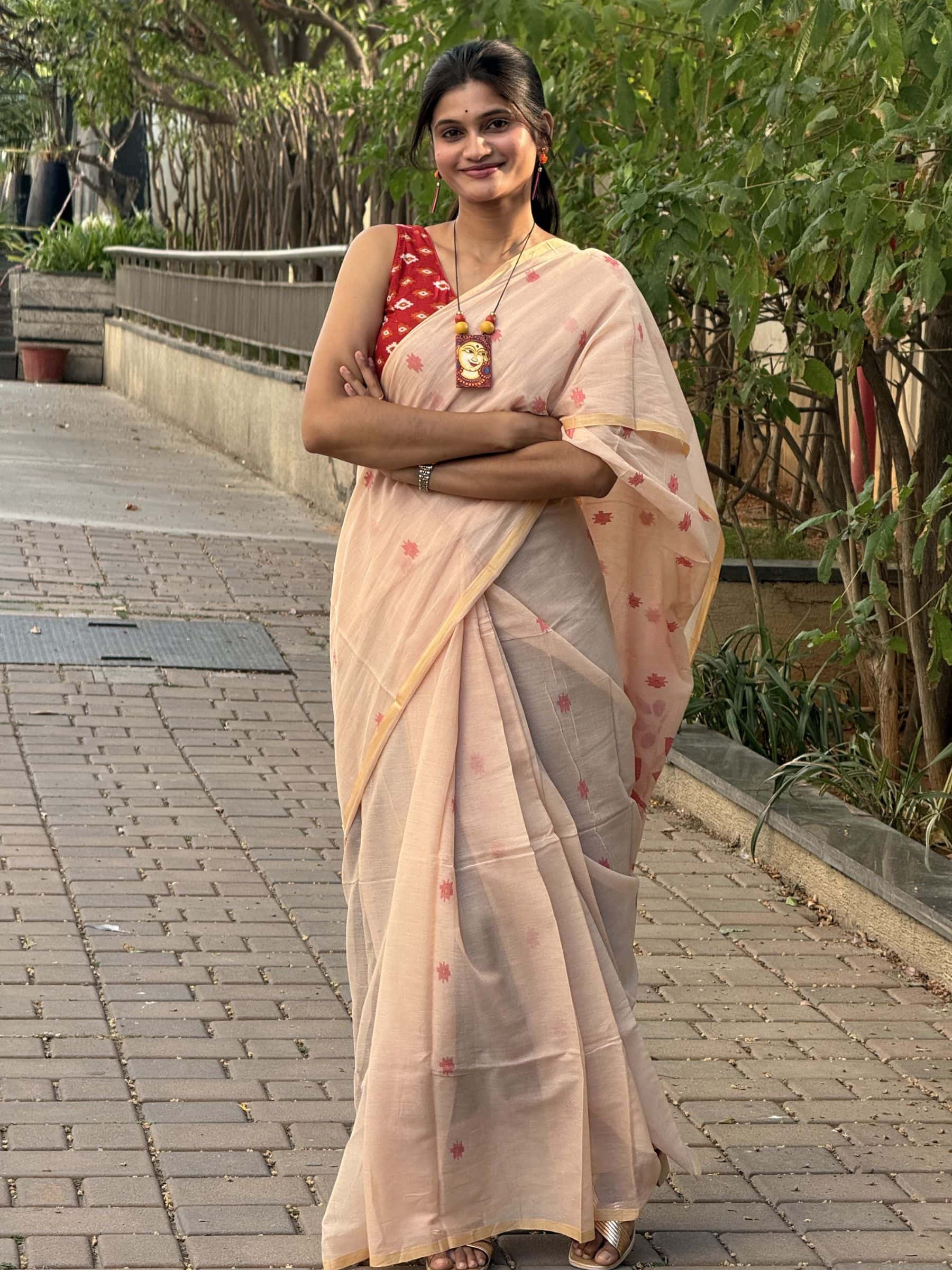 Peach handloom needle Jamdani cotton saree with red buttas