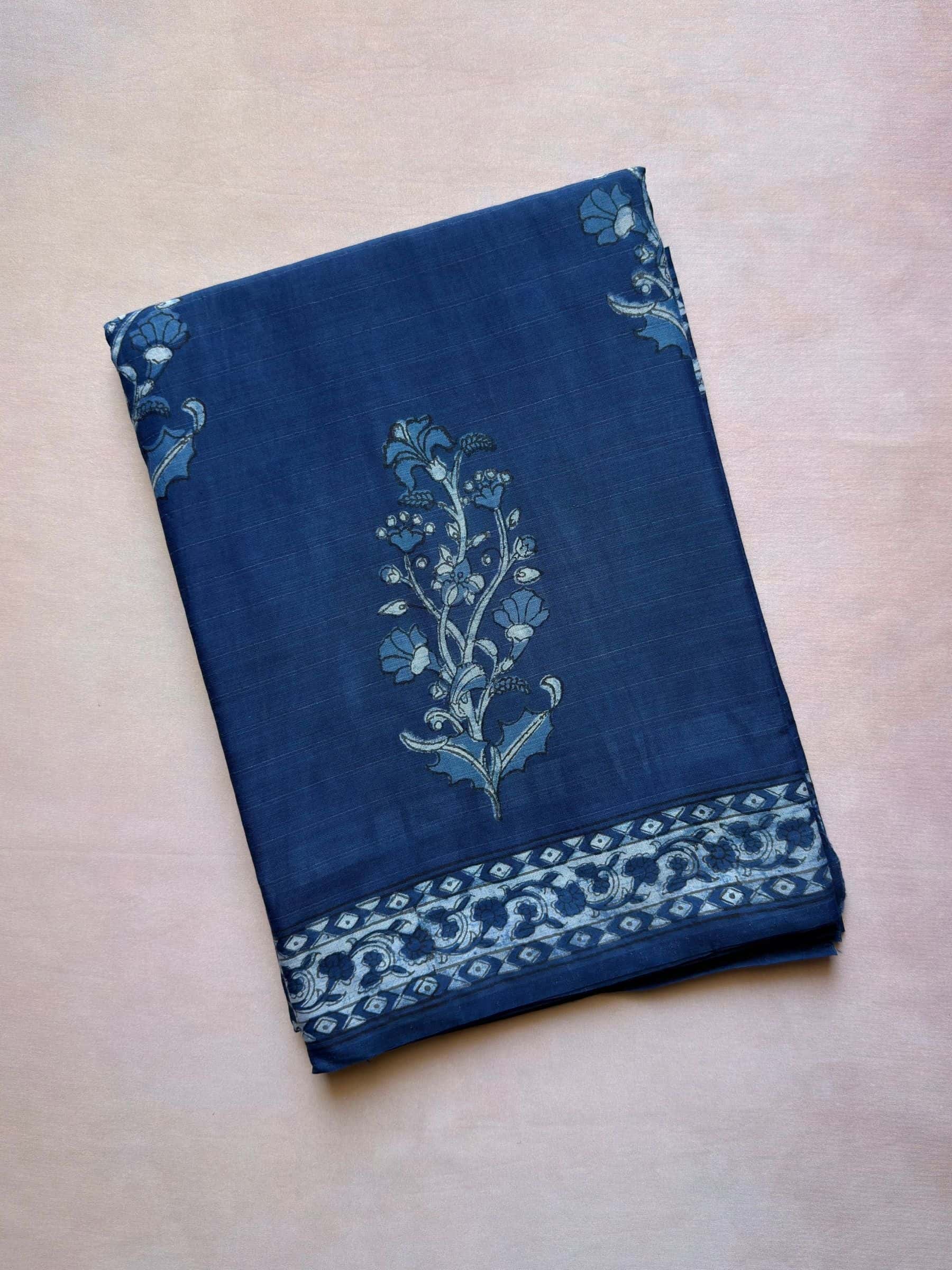 Blue dabu hand block printed banana silk cotton saree