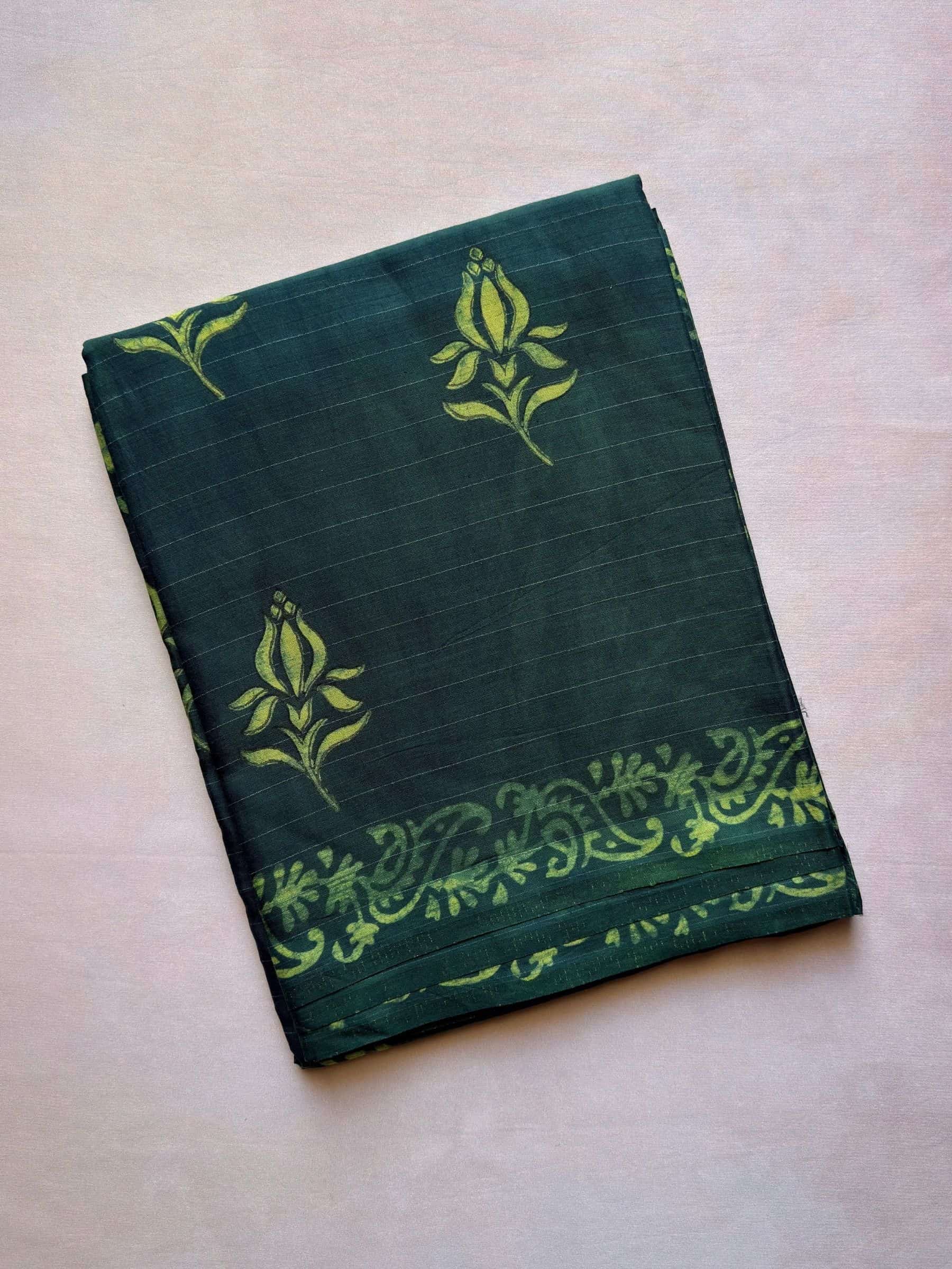 Deep green indigo hand block printed banana silk cotton saree