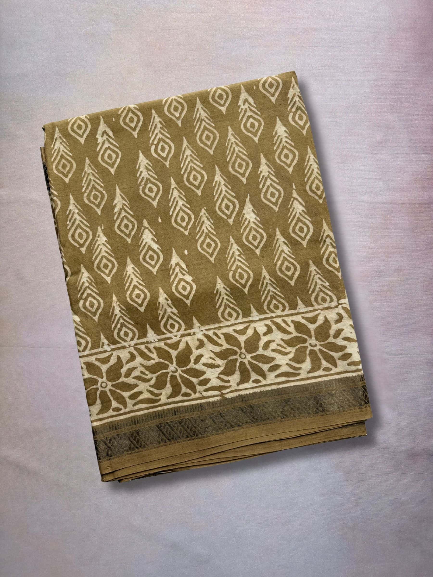 Olive brown Dabu hand block printed banana silk cotton saree