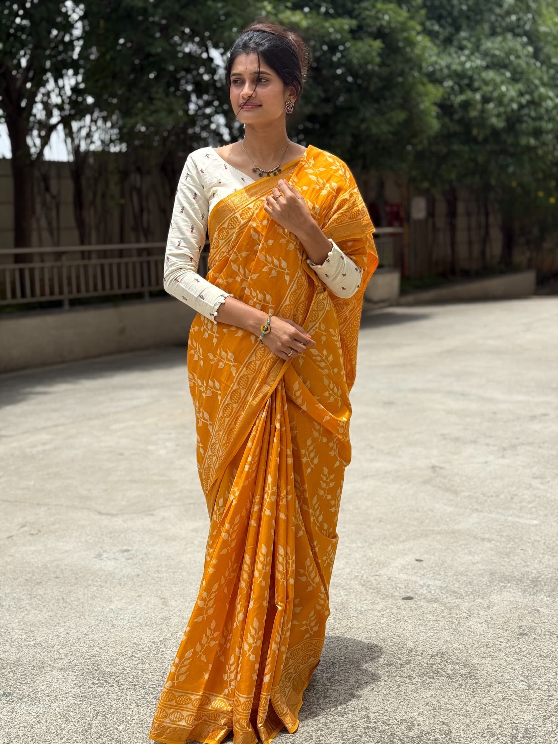 Yellow Banana Silk Saree with Dabu hand block print and zari border