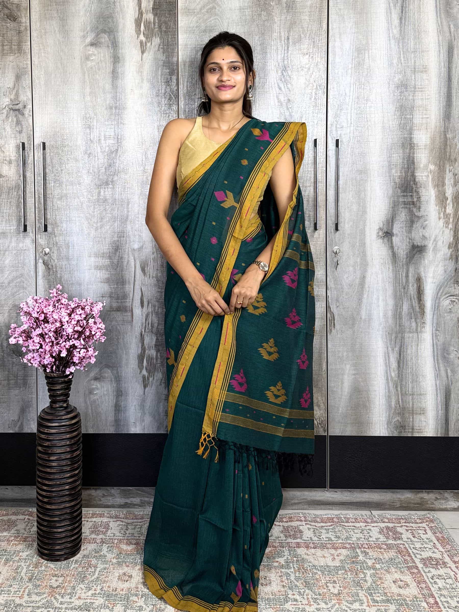 Deep green jacquard Jamdani cotton saree with mustard border