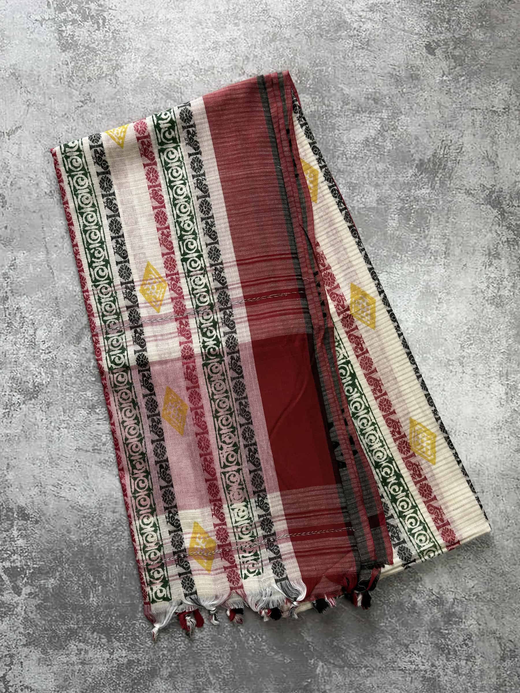 Handloom Dhonekhali cotton saree with block printed stripes and red pallu