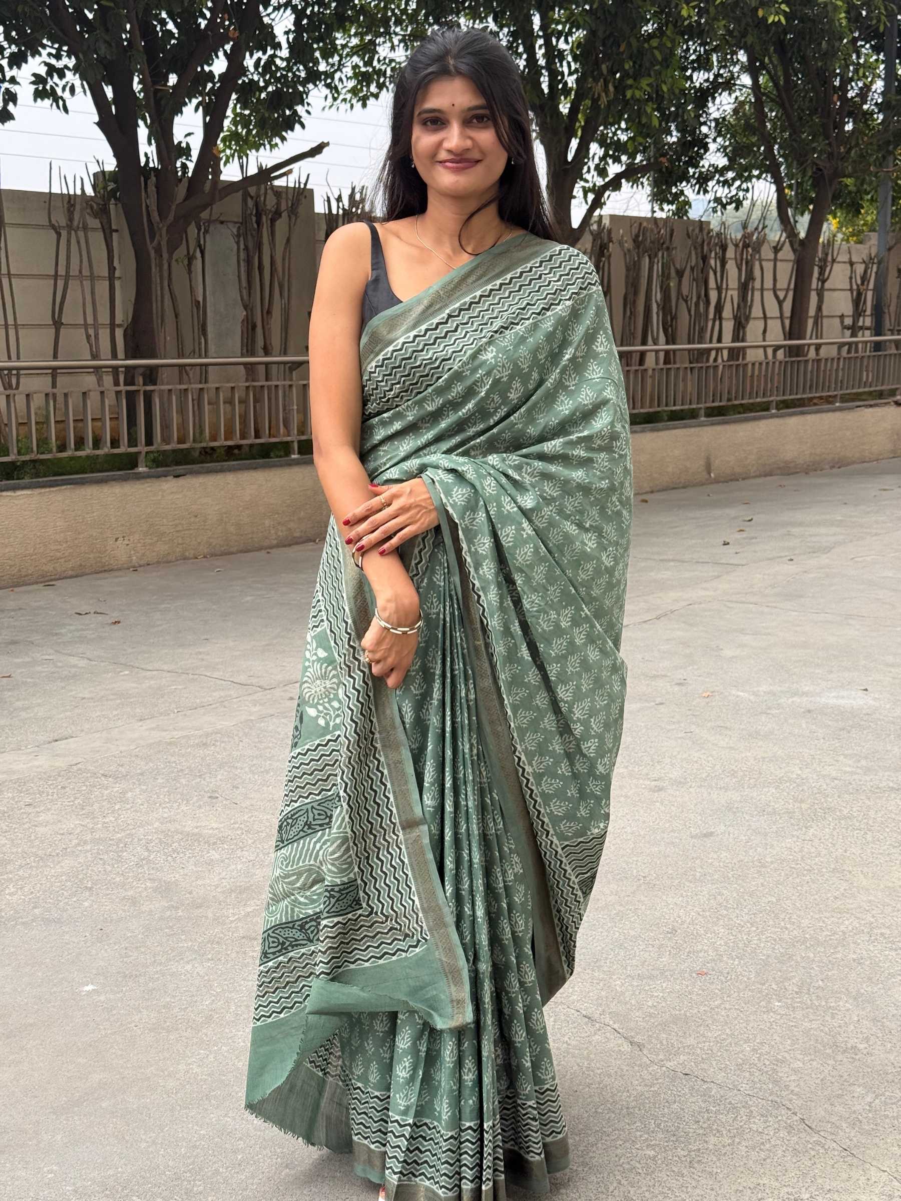 Sage green banana silk cotton saree with Dabu block prints