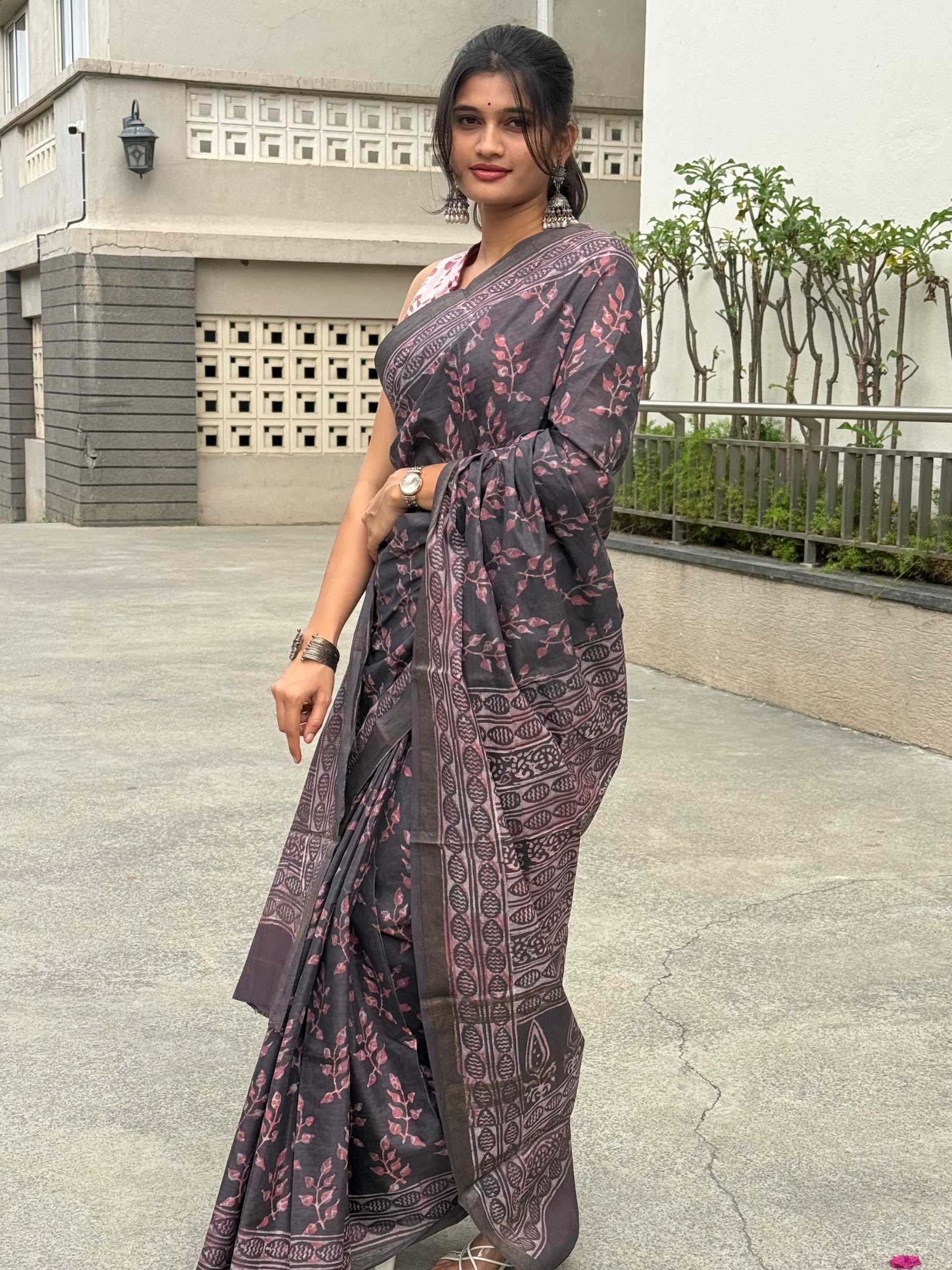 Charcoal grey banana silk cotton saree with dusty pink dabu prints