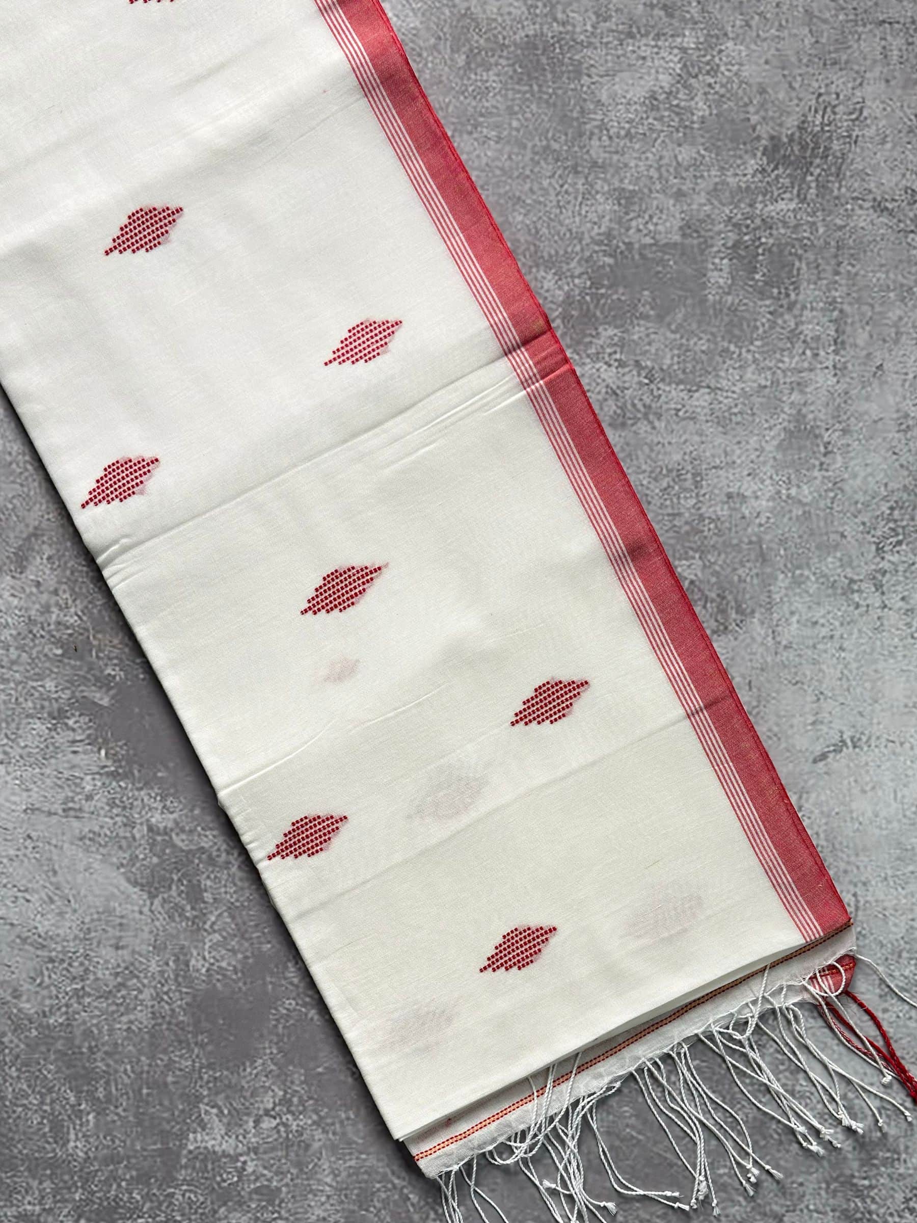 Off white handloom Bengal cotton Jamdani saree with red motifs