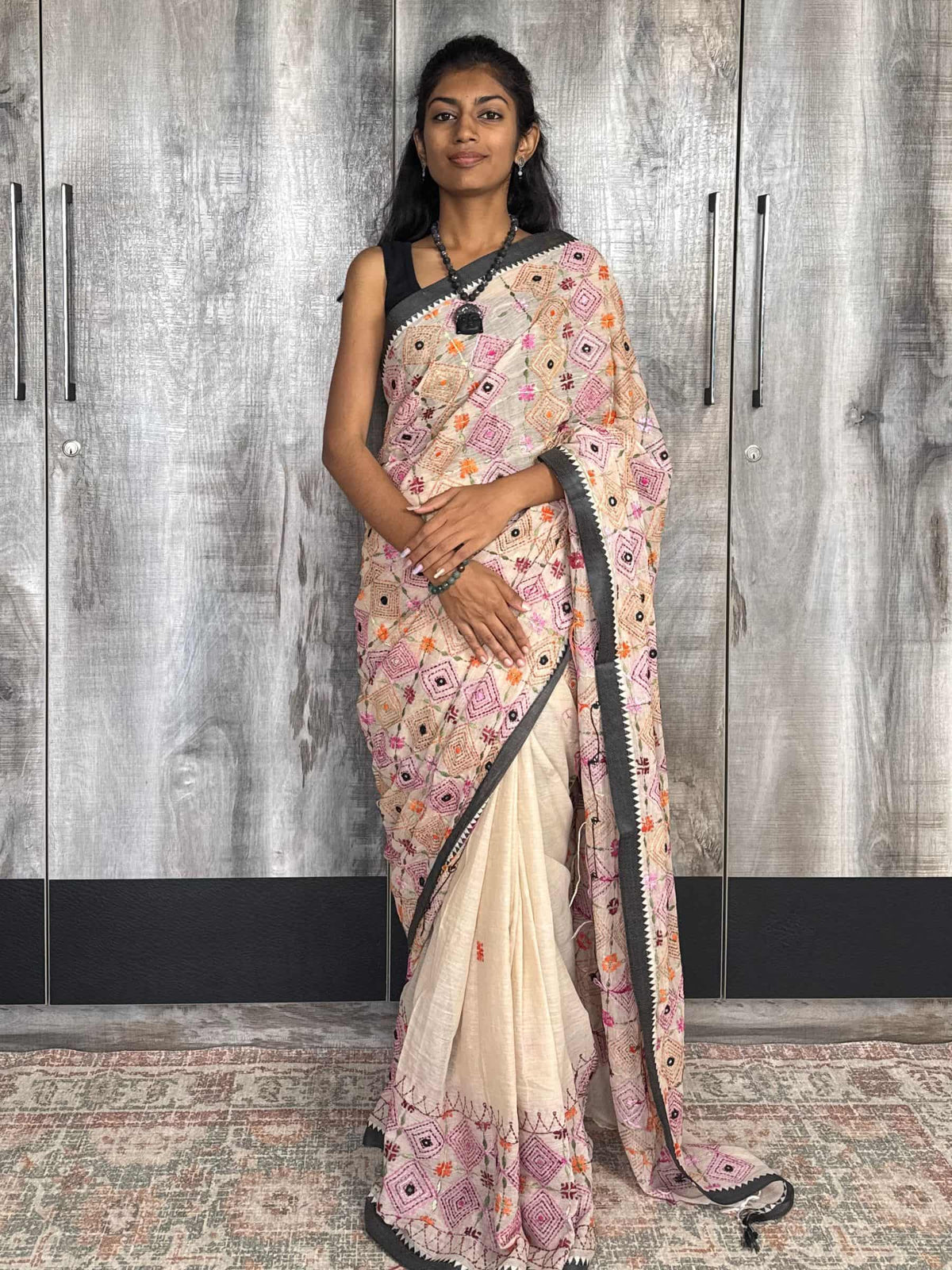 Handloom Dhonekhali cotton saree in beige with colorful hand embroidery