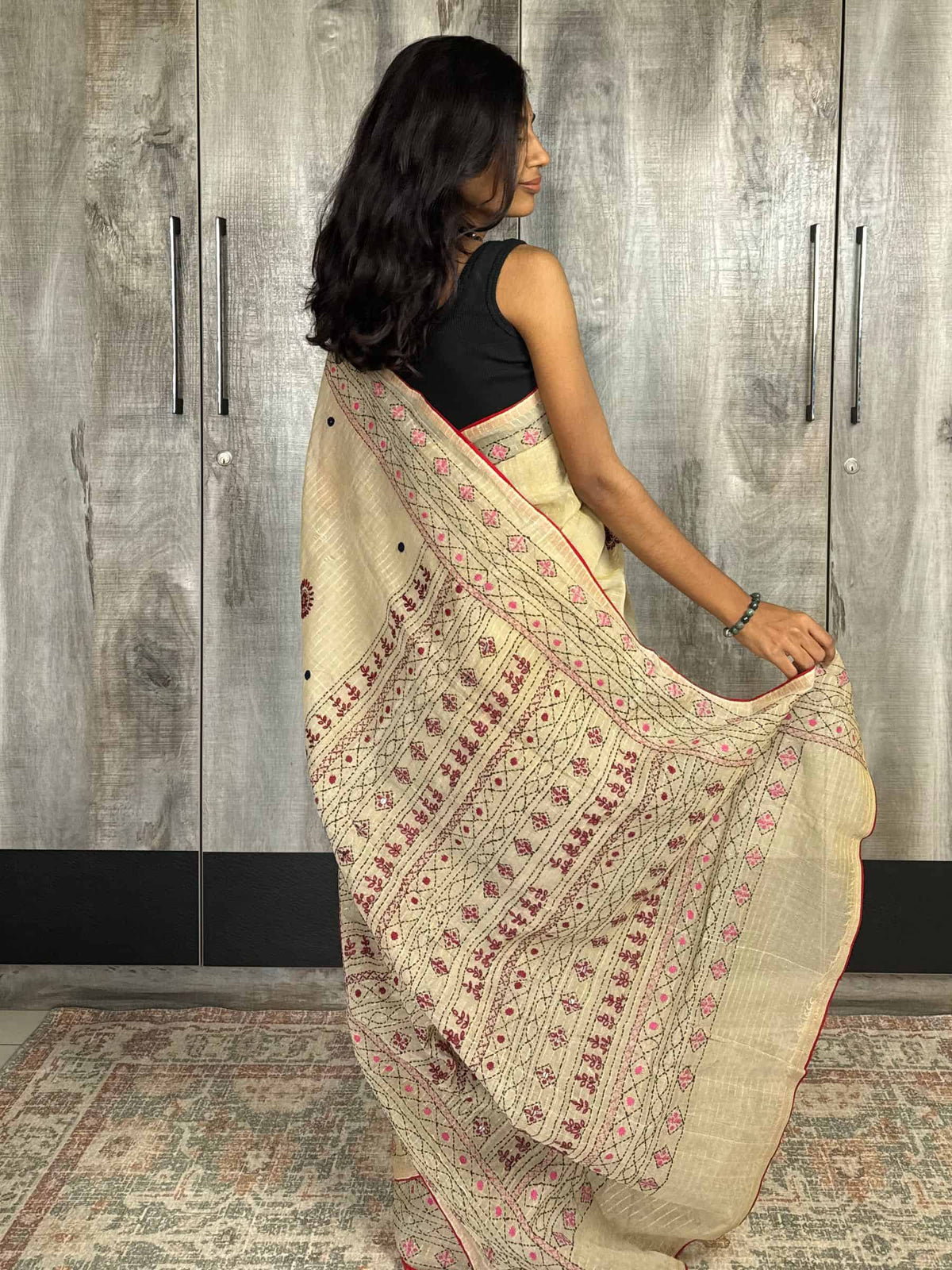 Beige Dhonekhali Tant cotton saree with multicolor embroidered border