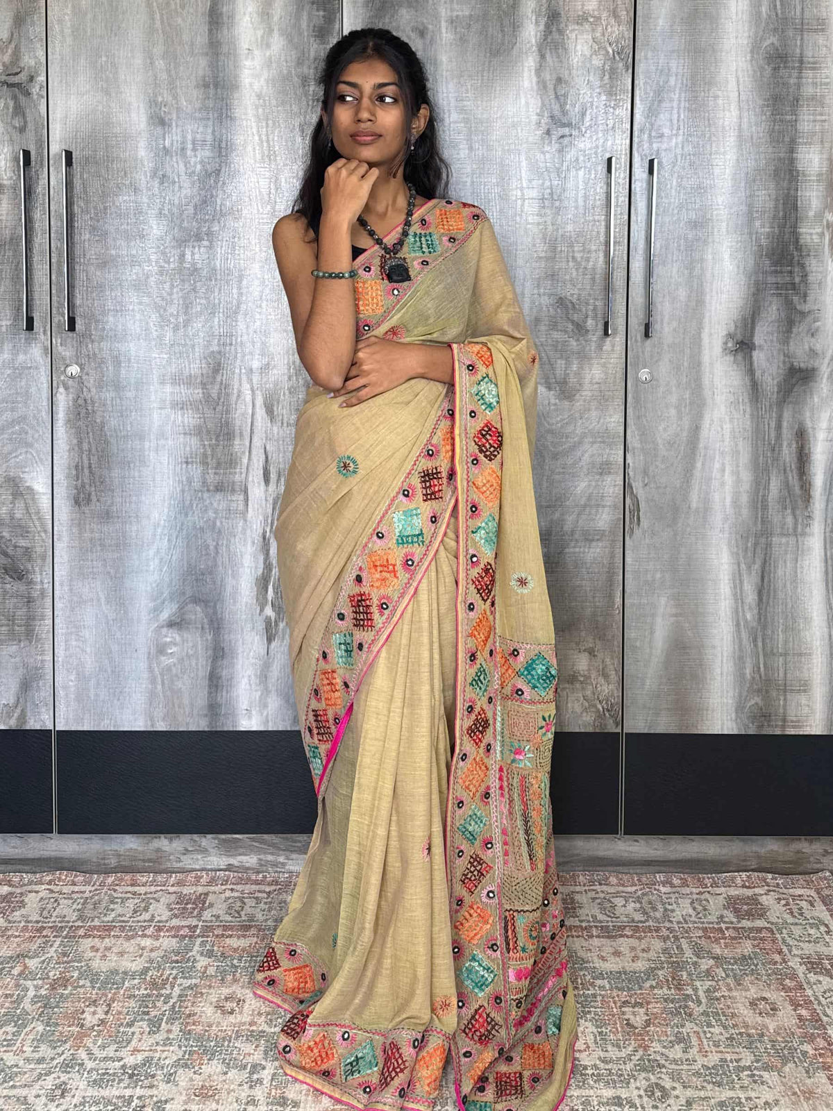 Handloom Dhonekhali cotton saree in beige with colorful hand embroidery