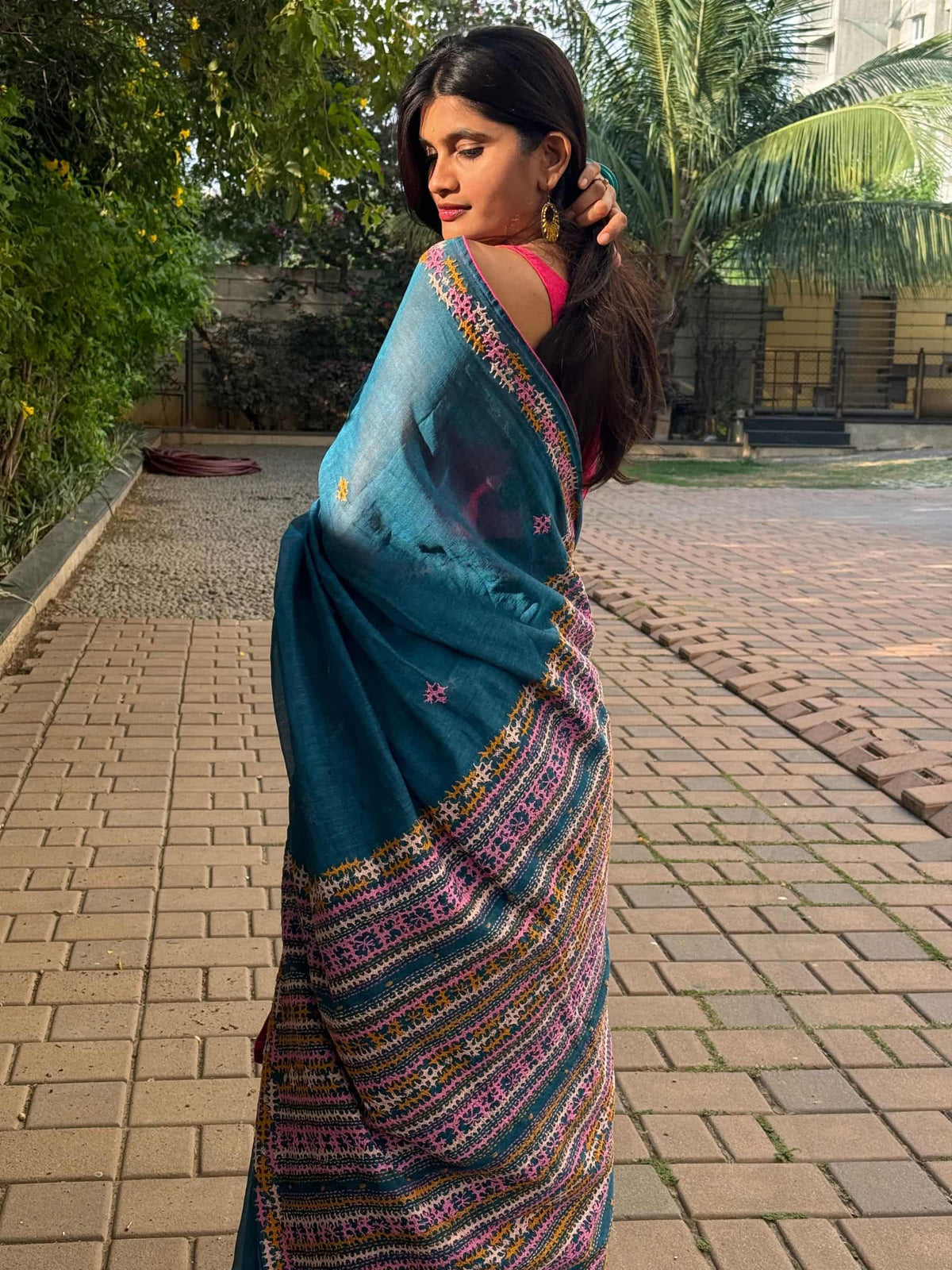 Handloom blue Dhonekhali Tant saree with colorful embroidered pallu