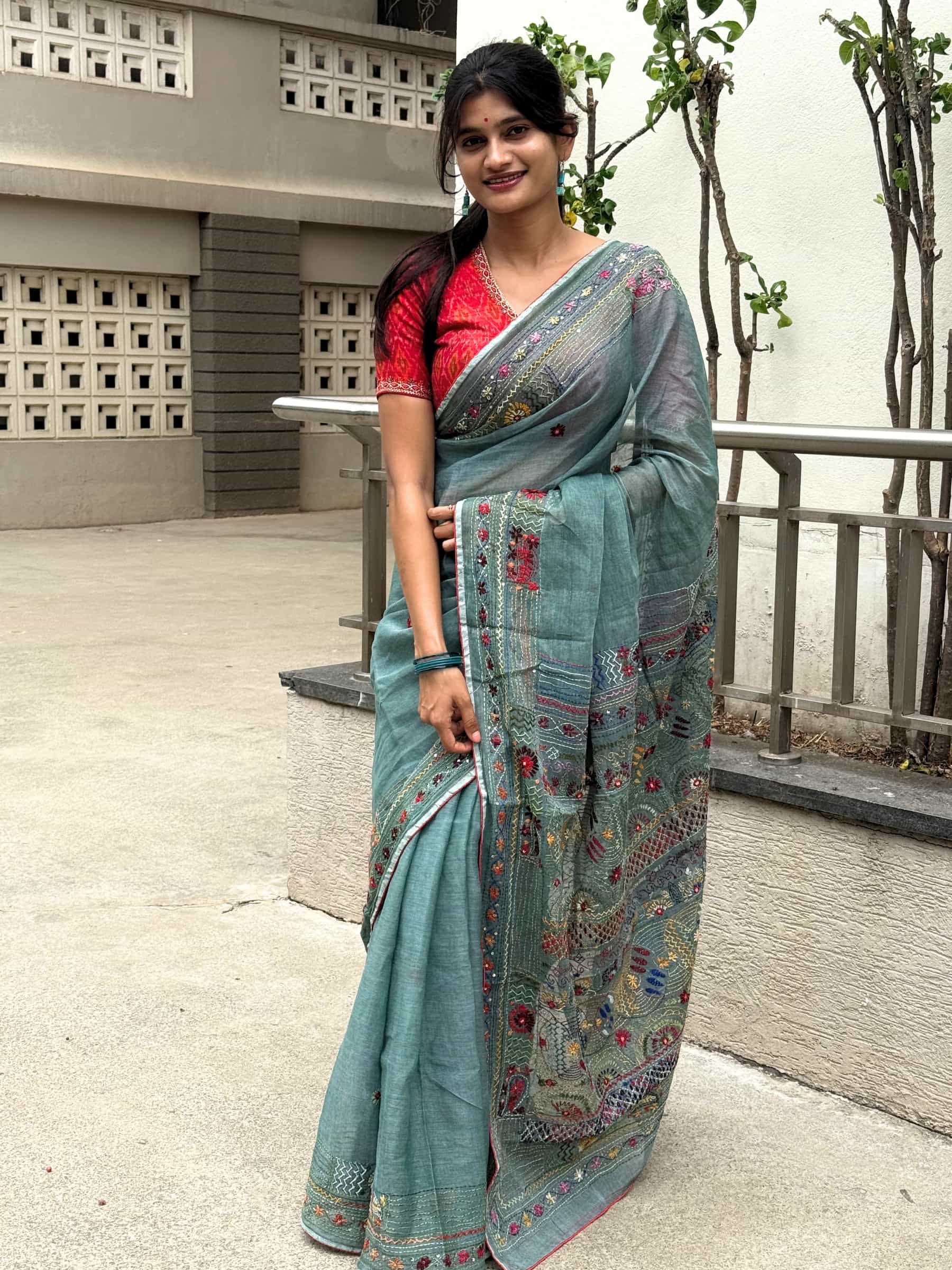 Teal blue Dhonekhali Tant saree with colorful hand Kantha and Gujarati stitch work
