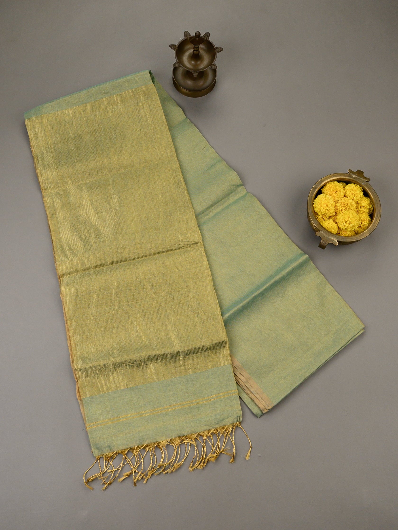 Handloom Maheshwari tissue silk saree in light green and gold