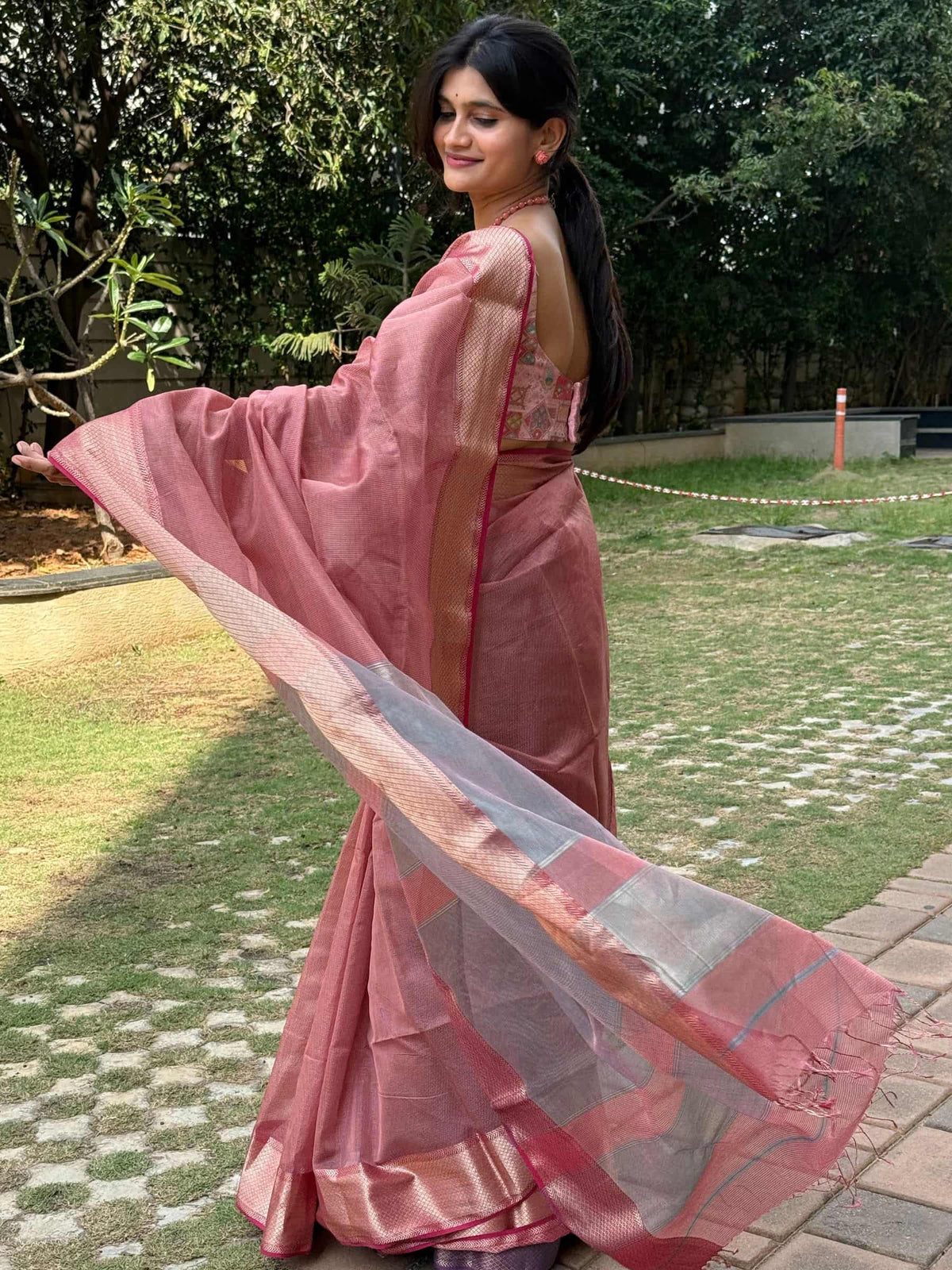 Handloom Maheshwari saree in pink and blue with golden zari
