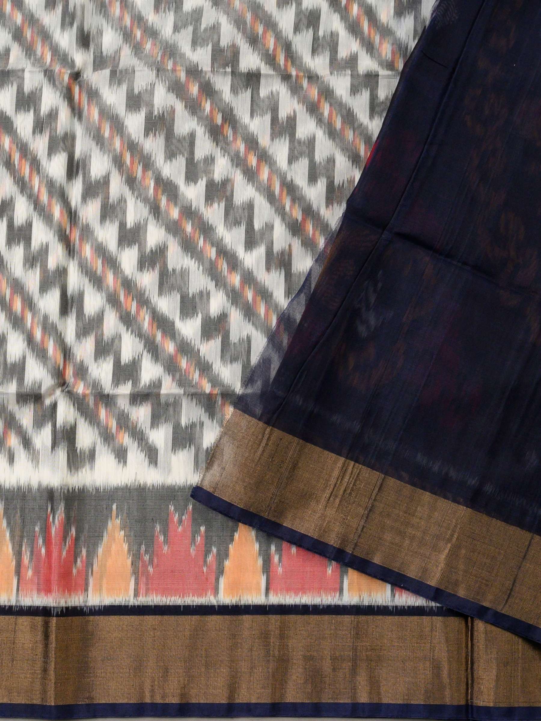 Handloom Pochampally Silk Cotton Saree in White and Blue with Zigzag Ikat Design