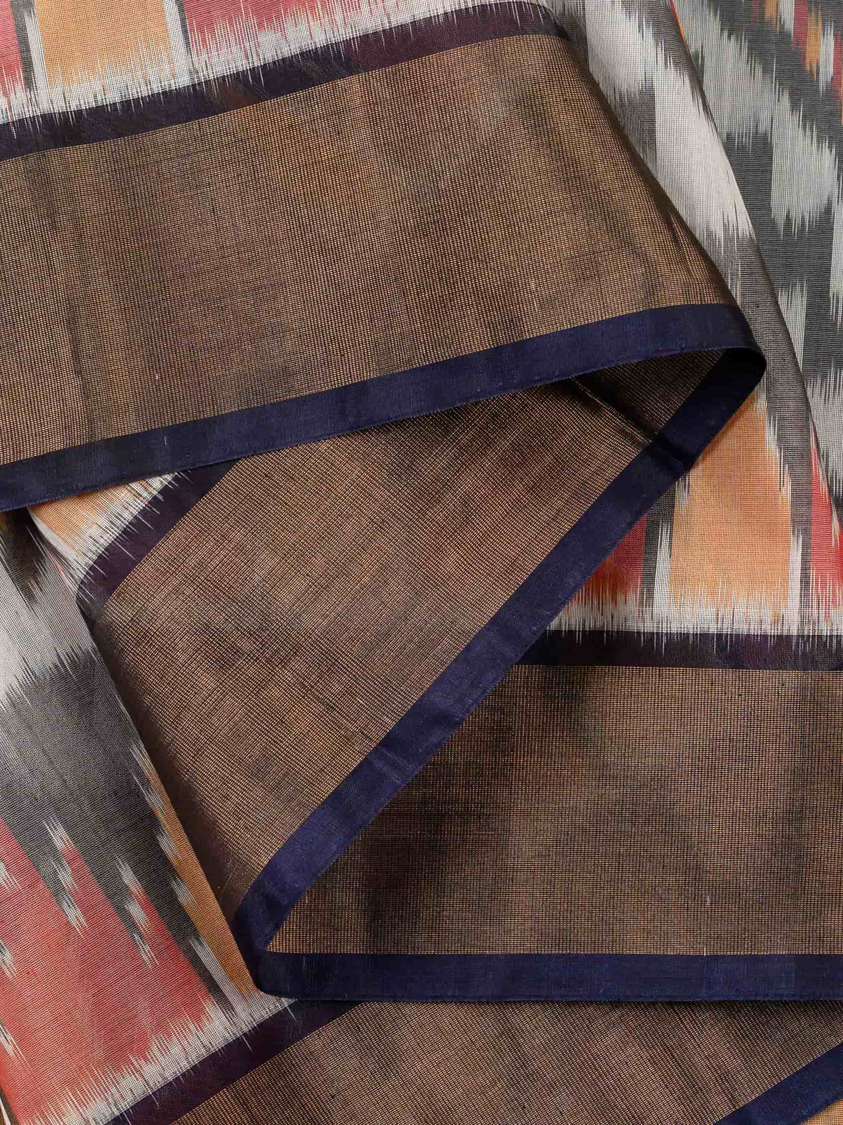 Handloom Pochampally Silk Cotton Saree in White and Blue with Zigzag Ikat Design