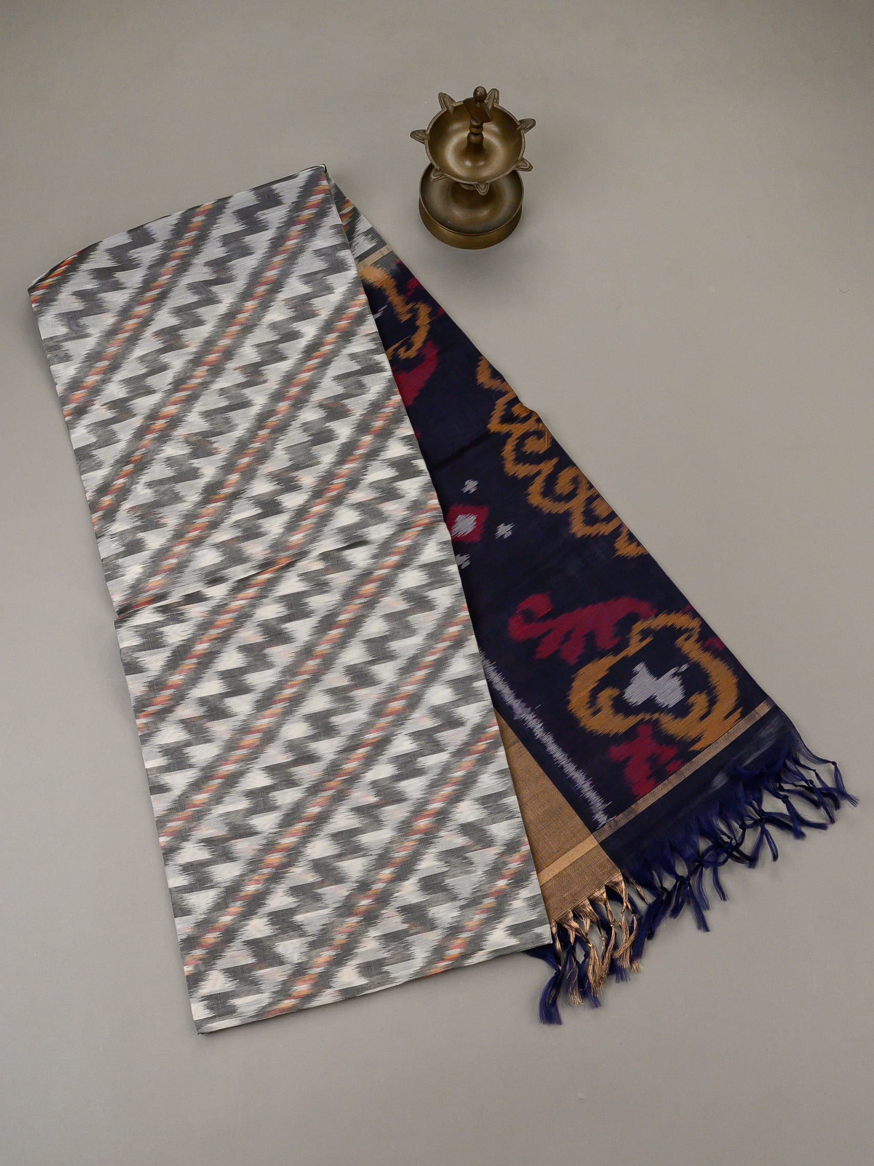 Handloom Pochampally Silk Cotton Saree in White and Blue with Zigzag Ikat Design