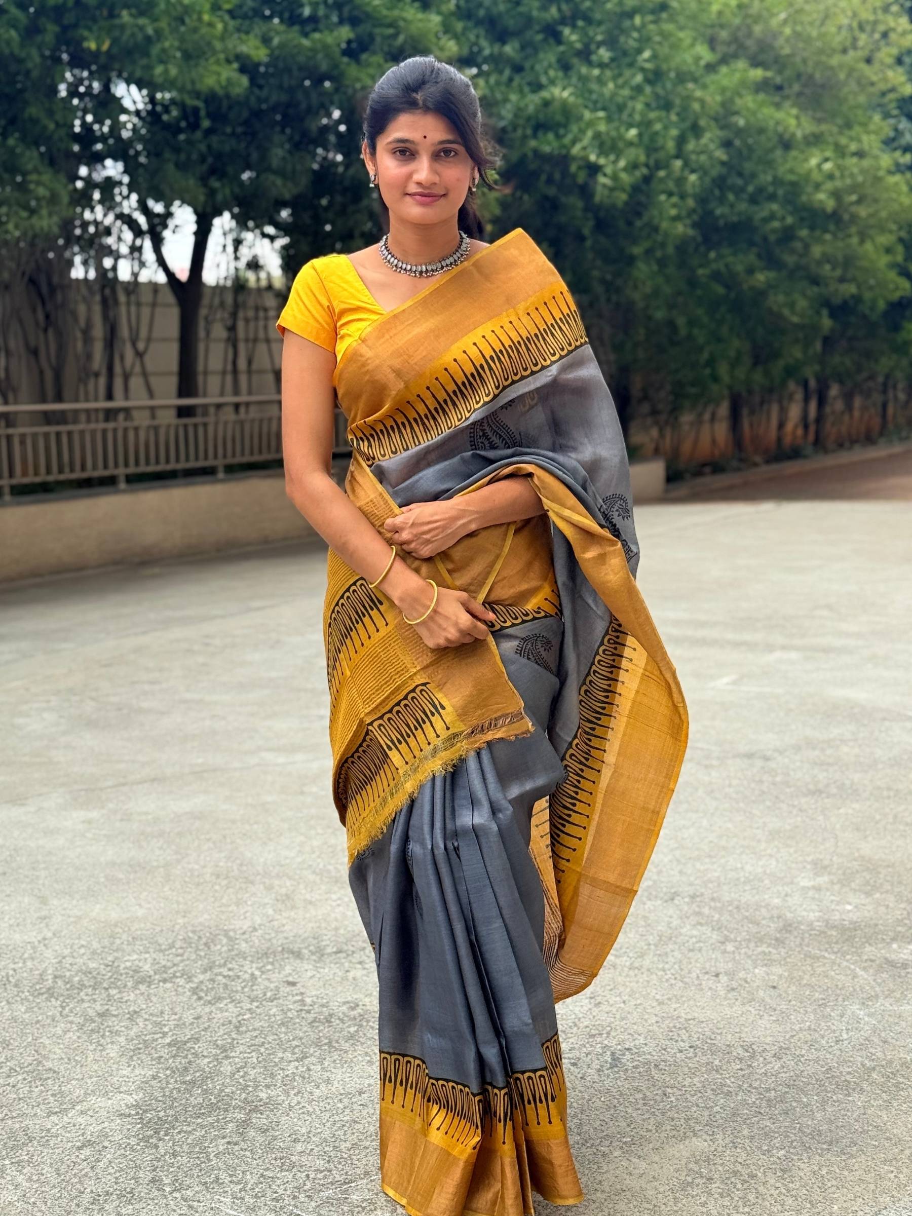 Grey and yellow handloom tussar silk saree with zari border