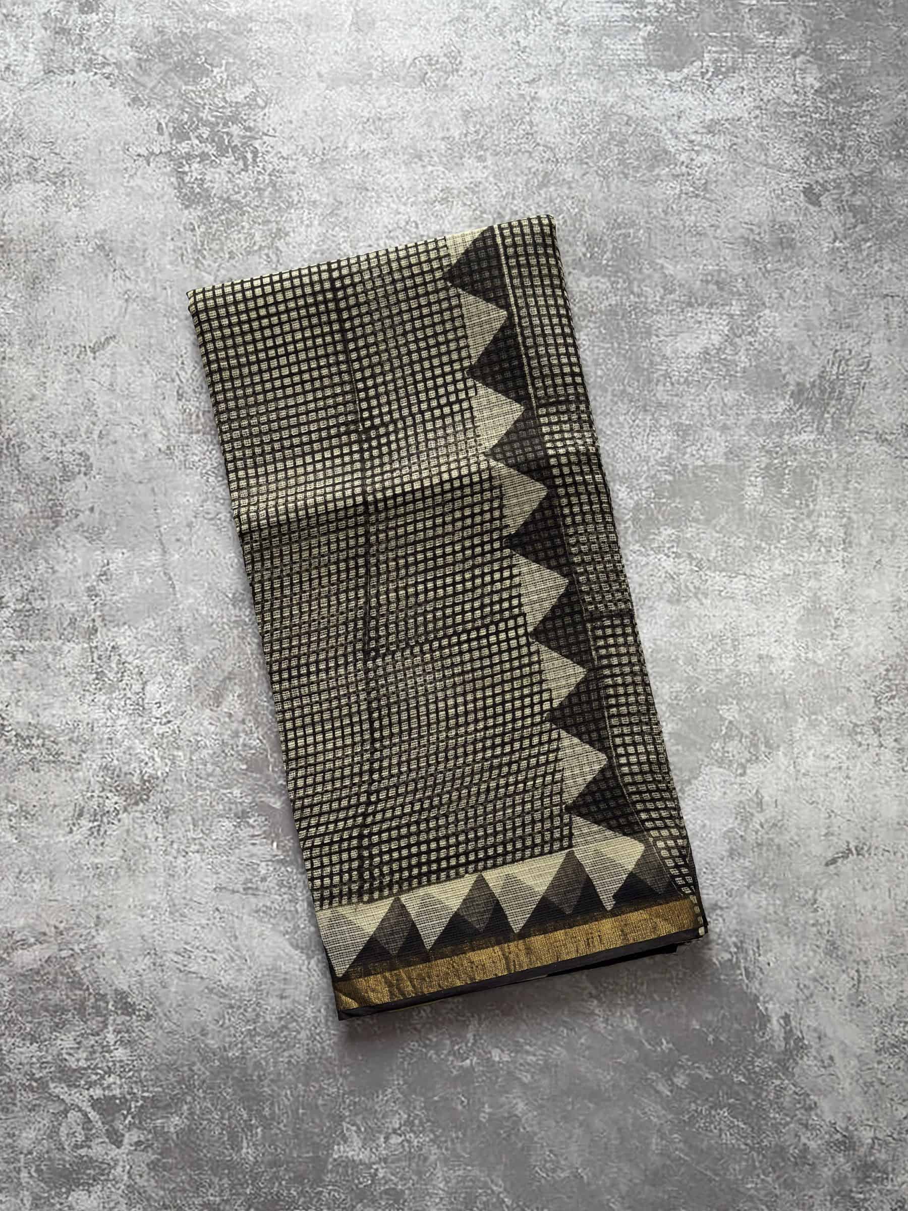 Beige Kota Doria saree with black check pattern and mustard paisley pallu