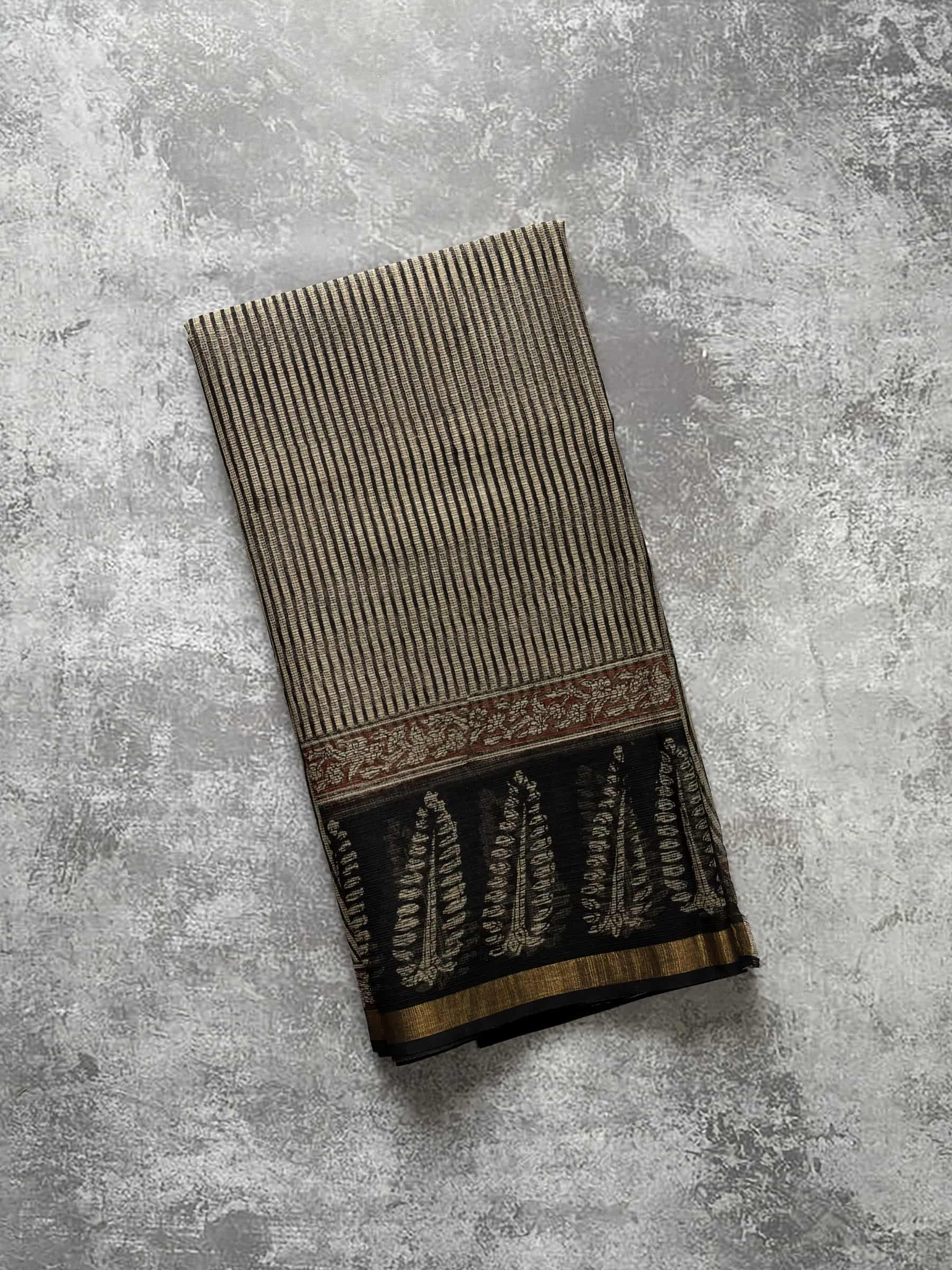 Charcoal brown hand block printed Kota Doria saree with traditional motifs