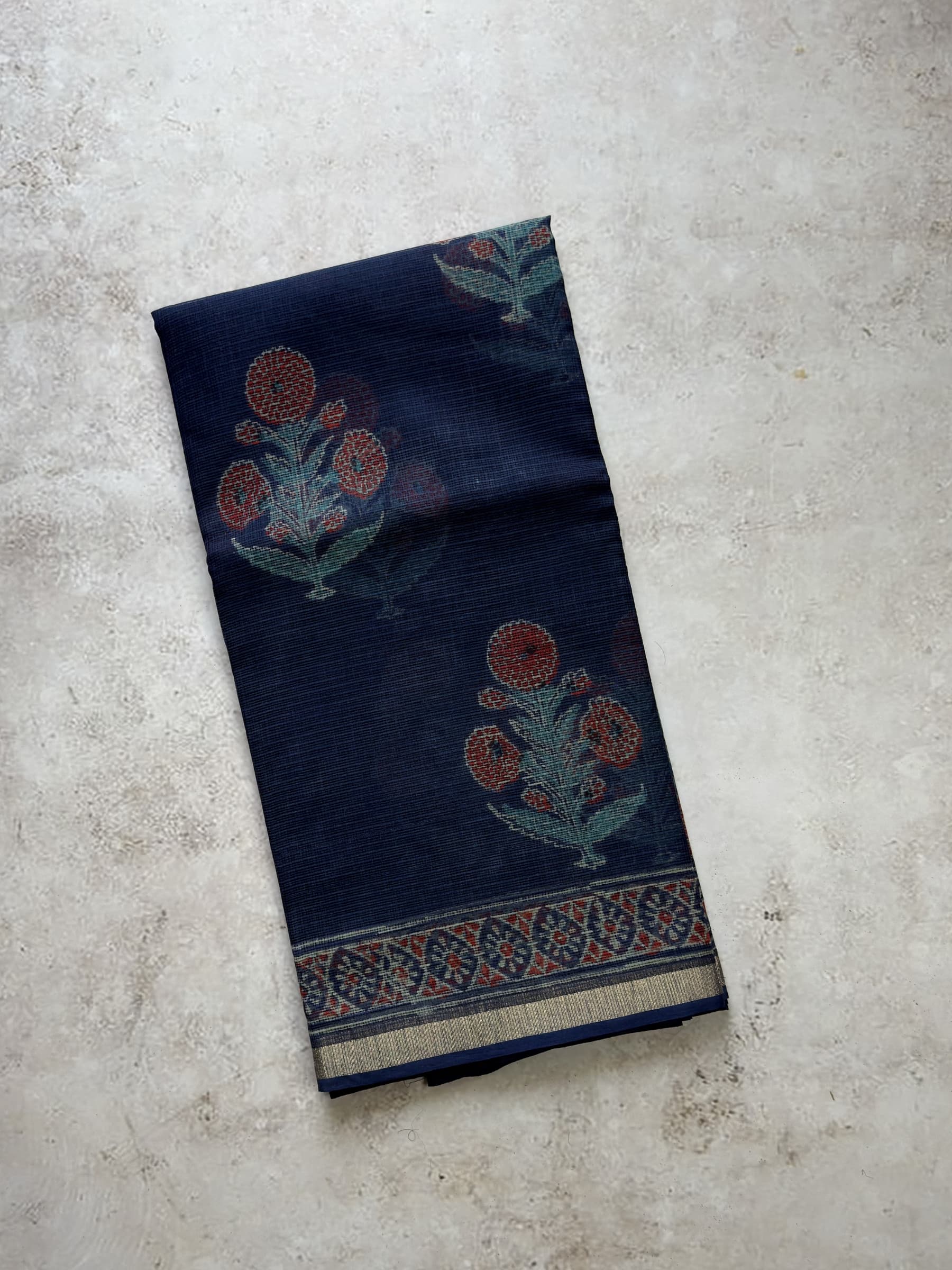 Indigo blue hand block printed Kota Doria saree with floral motifs