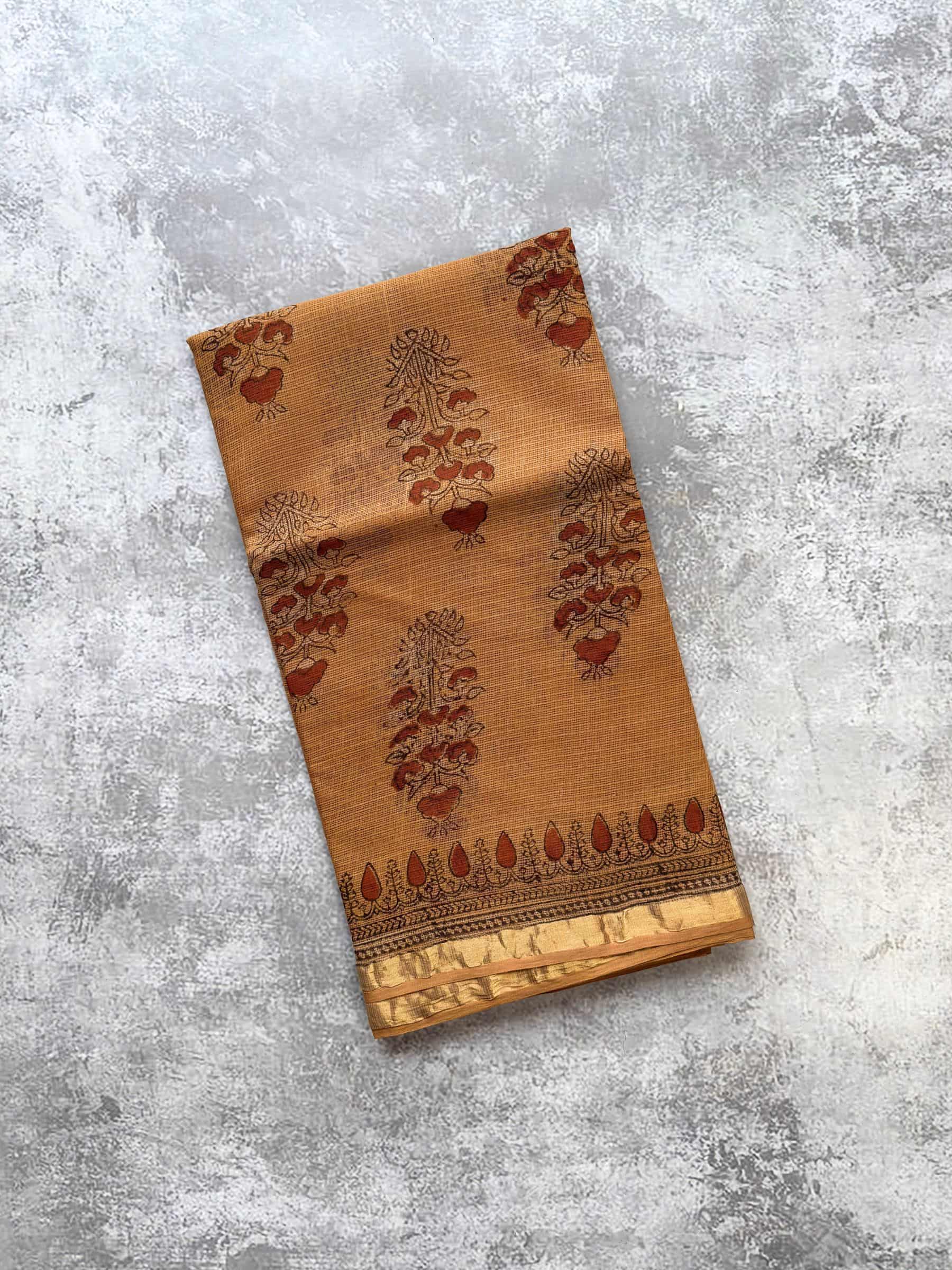 Hand block printed Kota Doria saree with traditional Jahota floral motifs in mustard beige