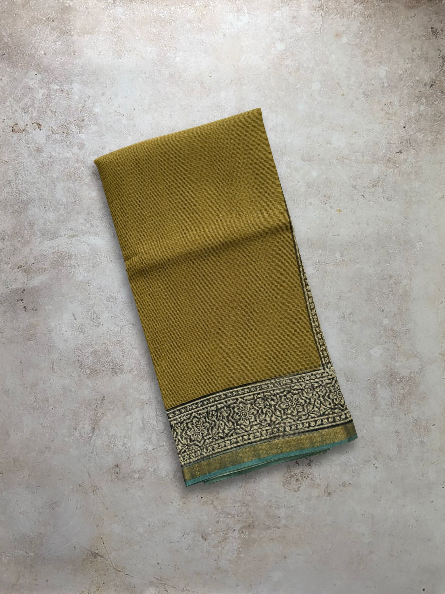 Mustard yellow hand block printed Kota Doria saree with paisley pallu and detailed border