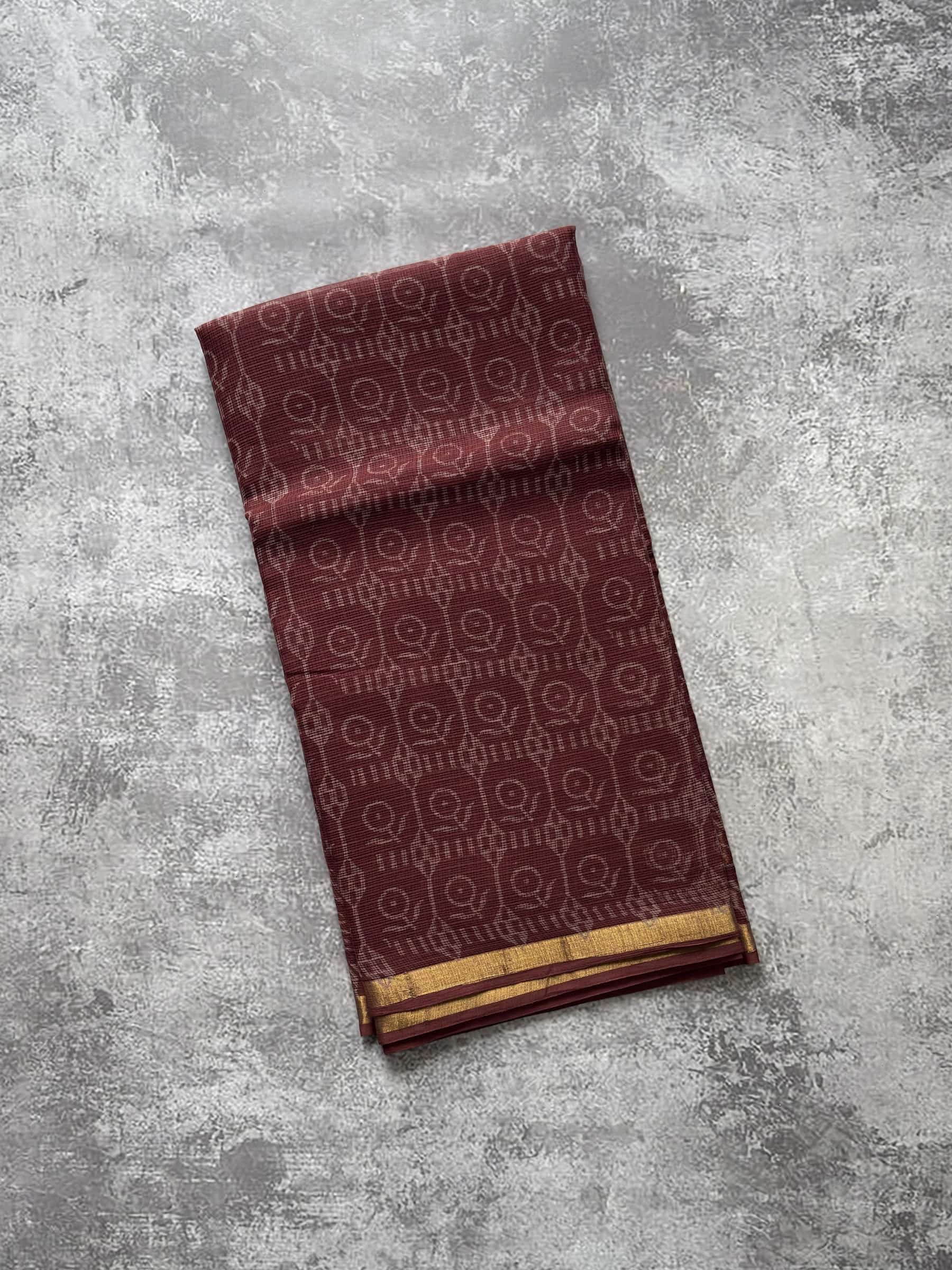 Rust red hand block printed Kota Doria saree with traditional motifs