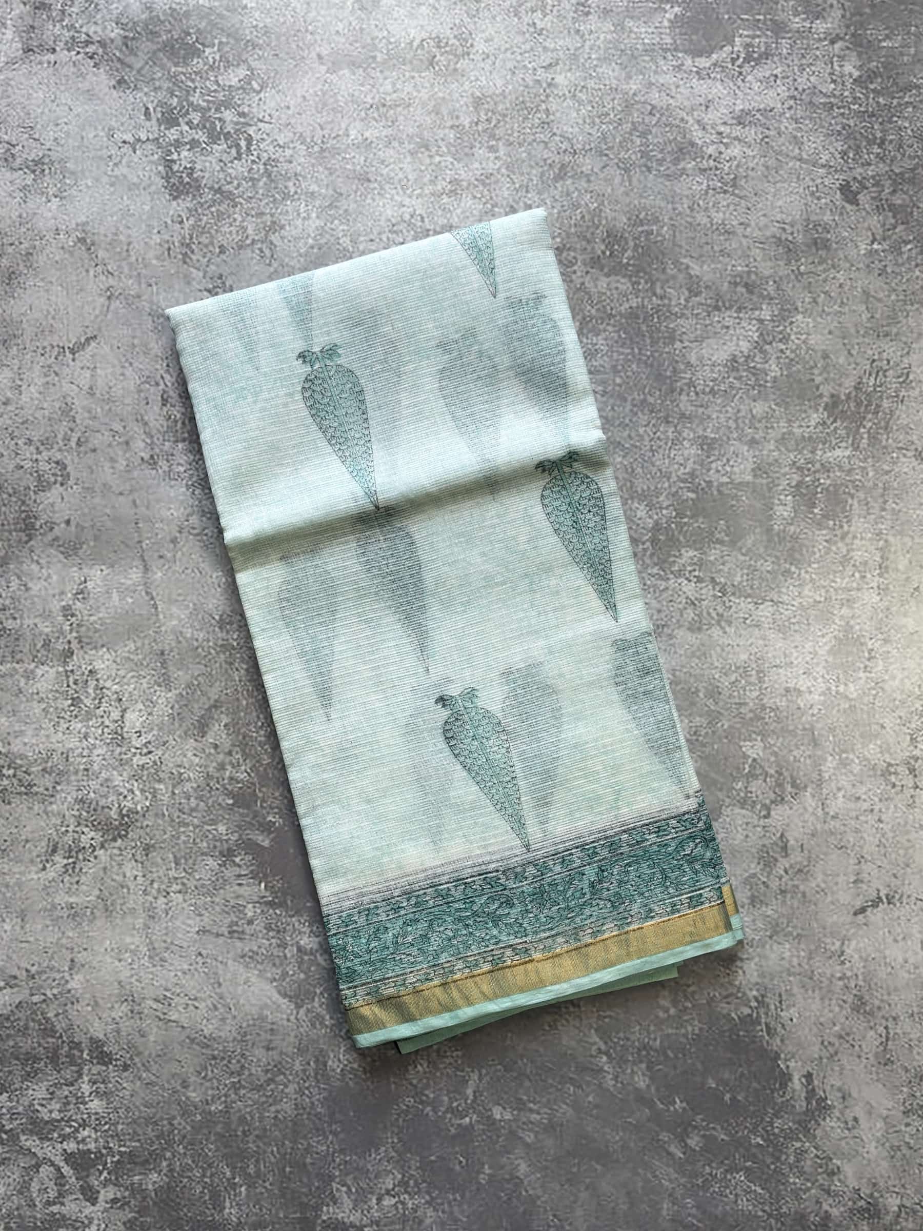 Mint green Kota Doria block printed saree with tree motifs